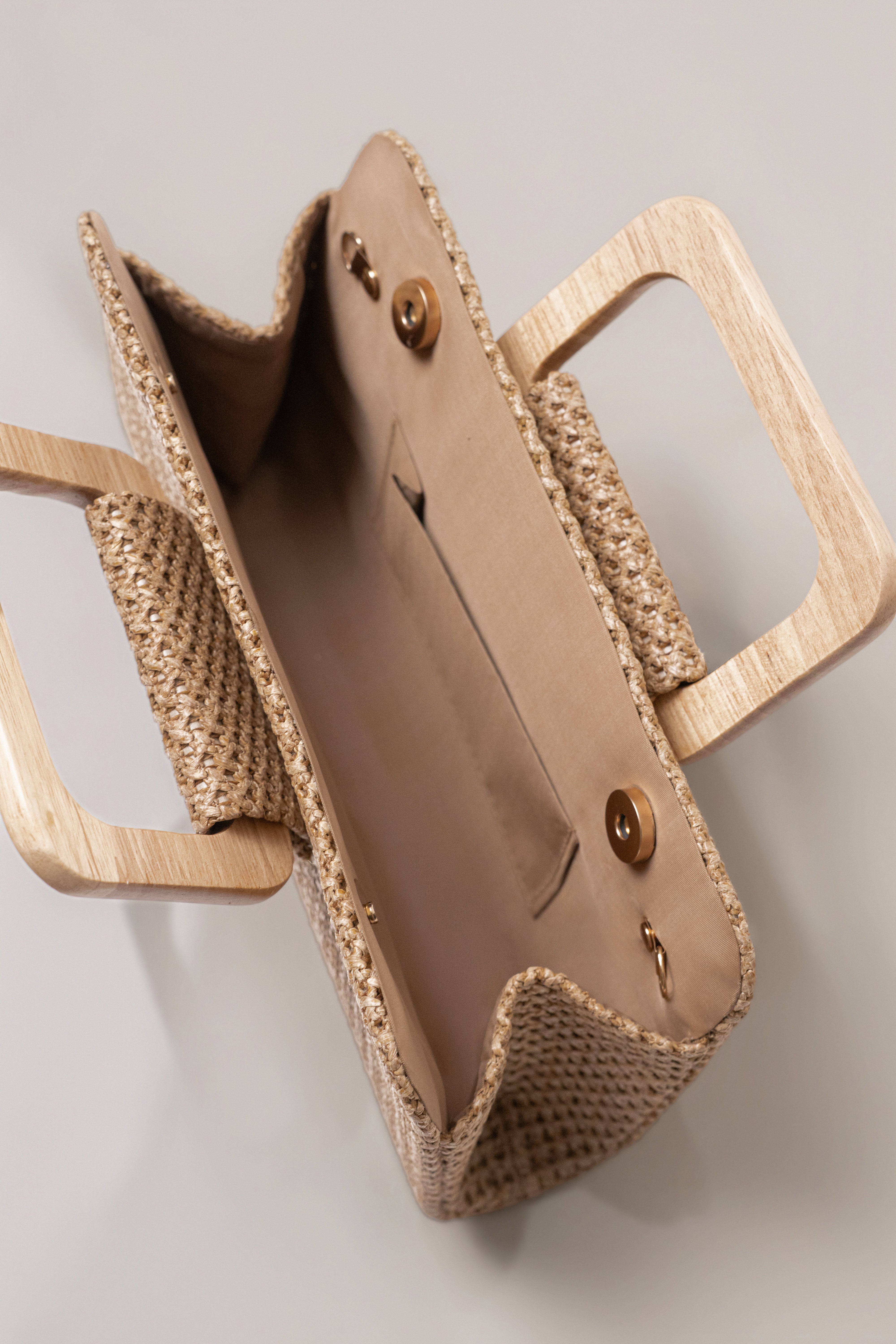 Brown driftwood clutch bag from JLUXLABEL, stylish accessories with a textured wooden design and elegant shape.