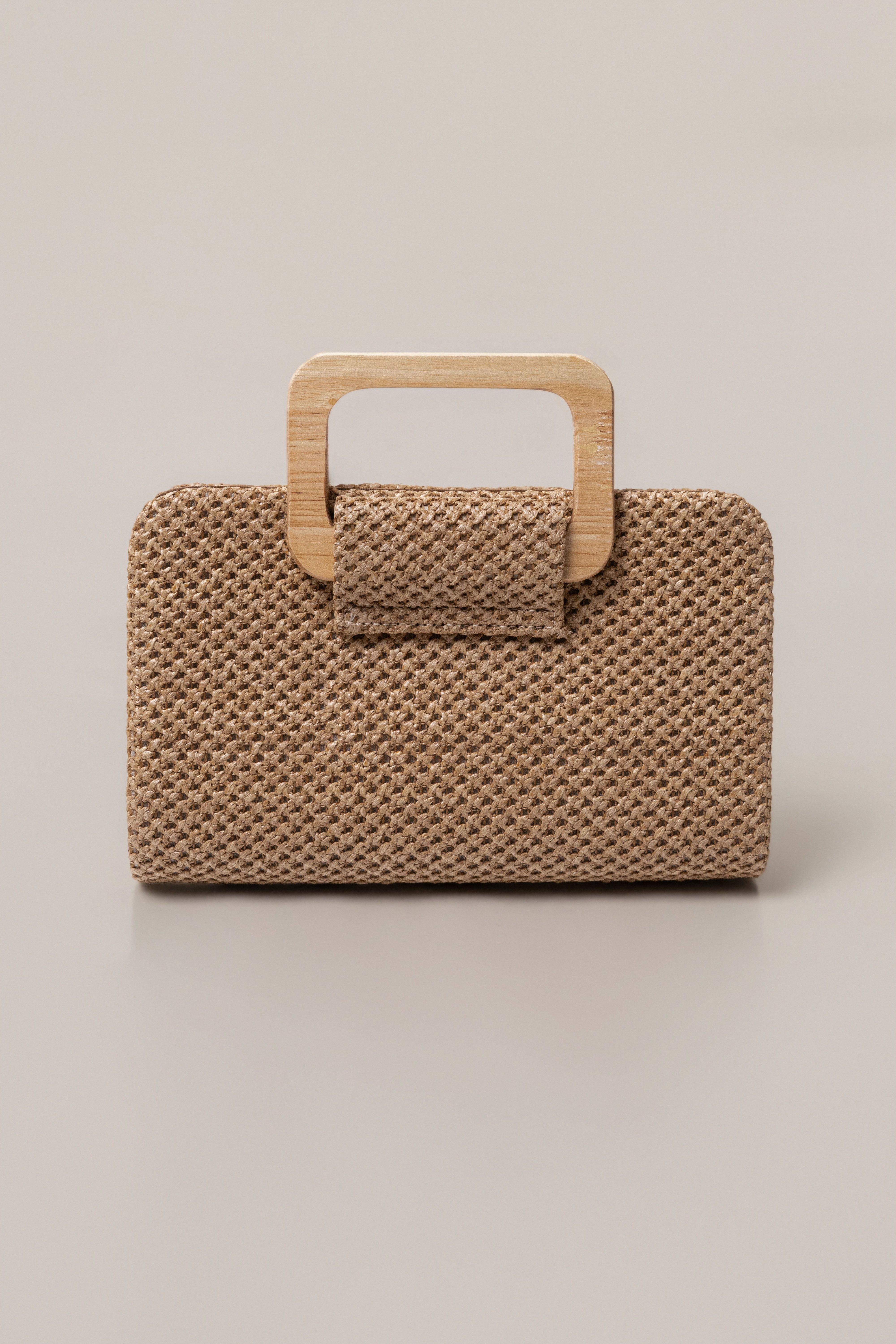 Brown driftwood clutch bag from JLUXLABEL, showcasing its textured accessory design and compact style.