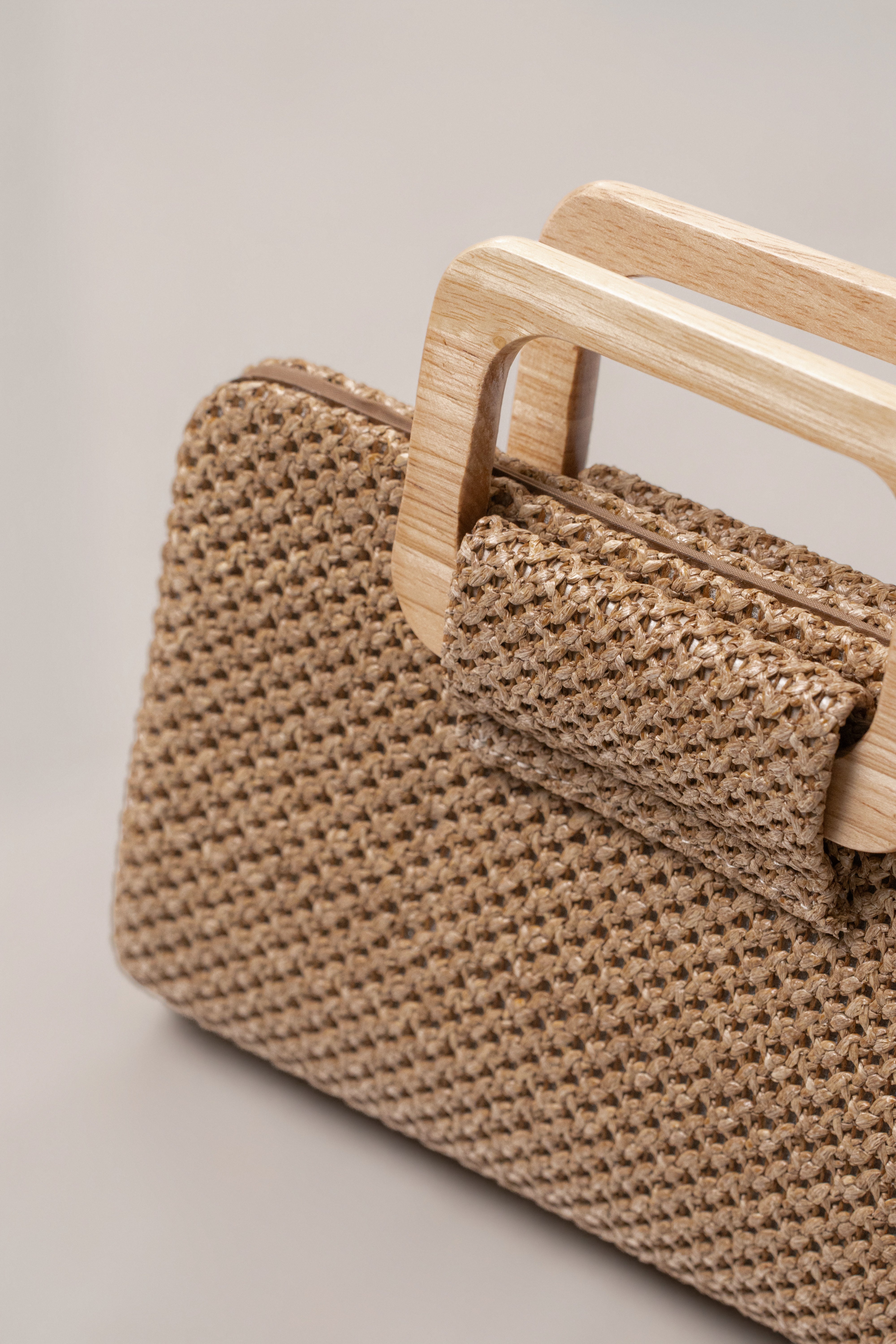 Brown driftwood clutch bag from JLUXLABEL, showcasing a stylish accessories item with natural wood texture and compact design.