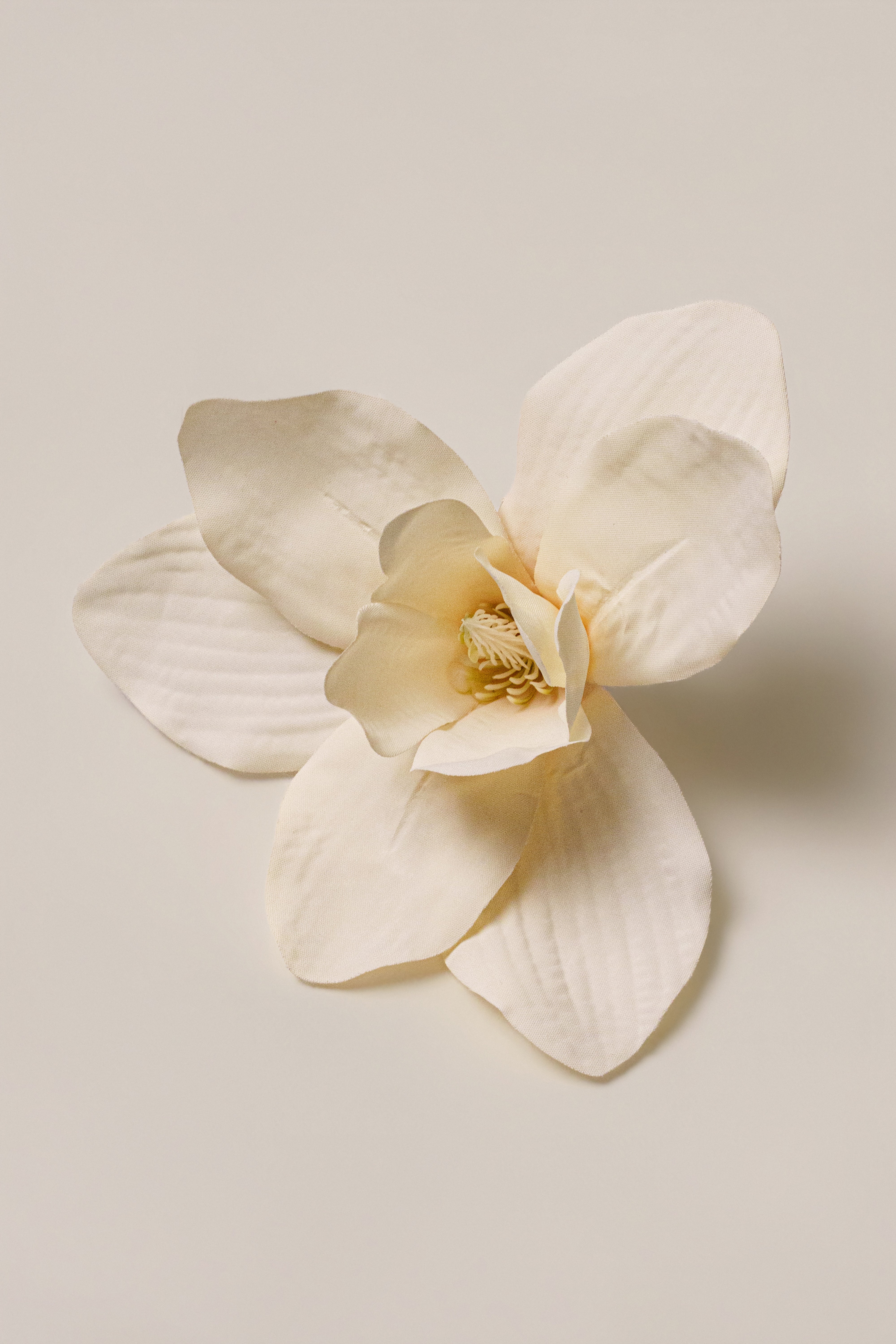 Ivory coastal orchid hair clip by JLUXLABEL, elegant accessory with floral design for stylish hair styling and decoration.