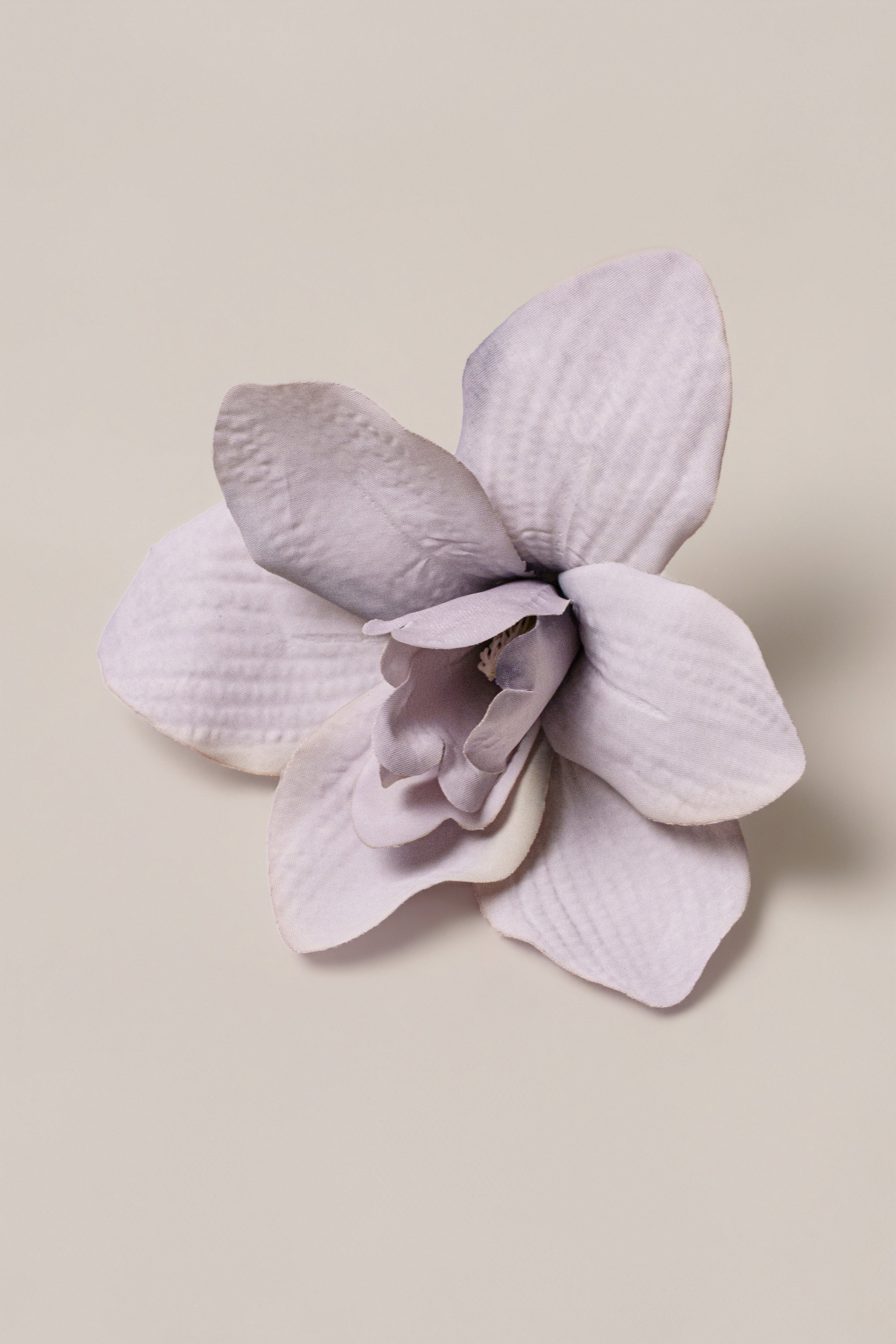 Purple coastal orchid hair clip from JLUXLABEL, featuring a decorative accessory with floral design for hair styling.