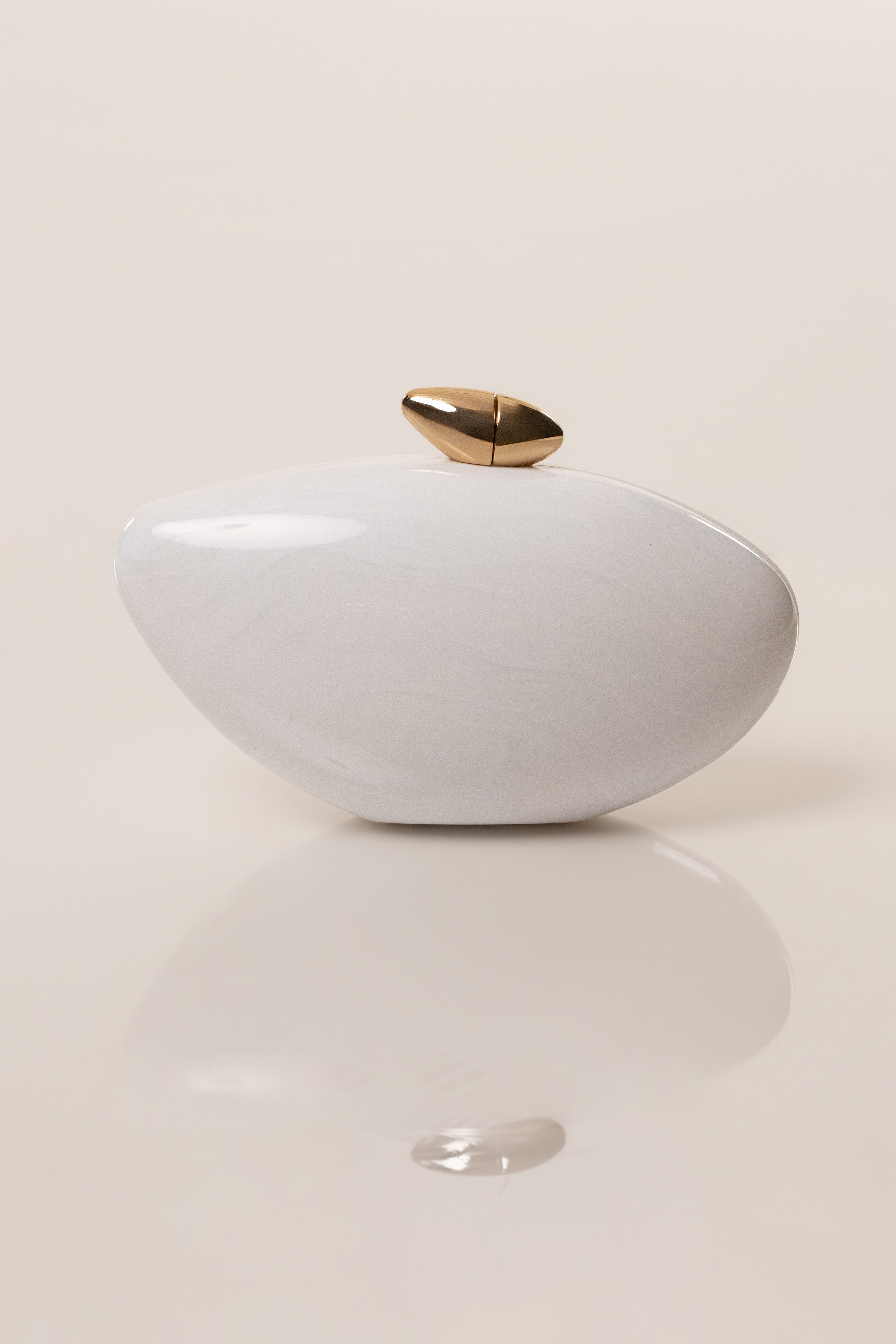 White Sea Muse pearl clutch bag by JLUXLABEL, elegant accessory with pearl accents and sleek design for special occasions.