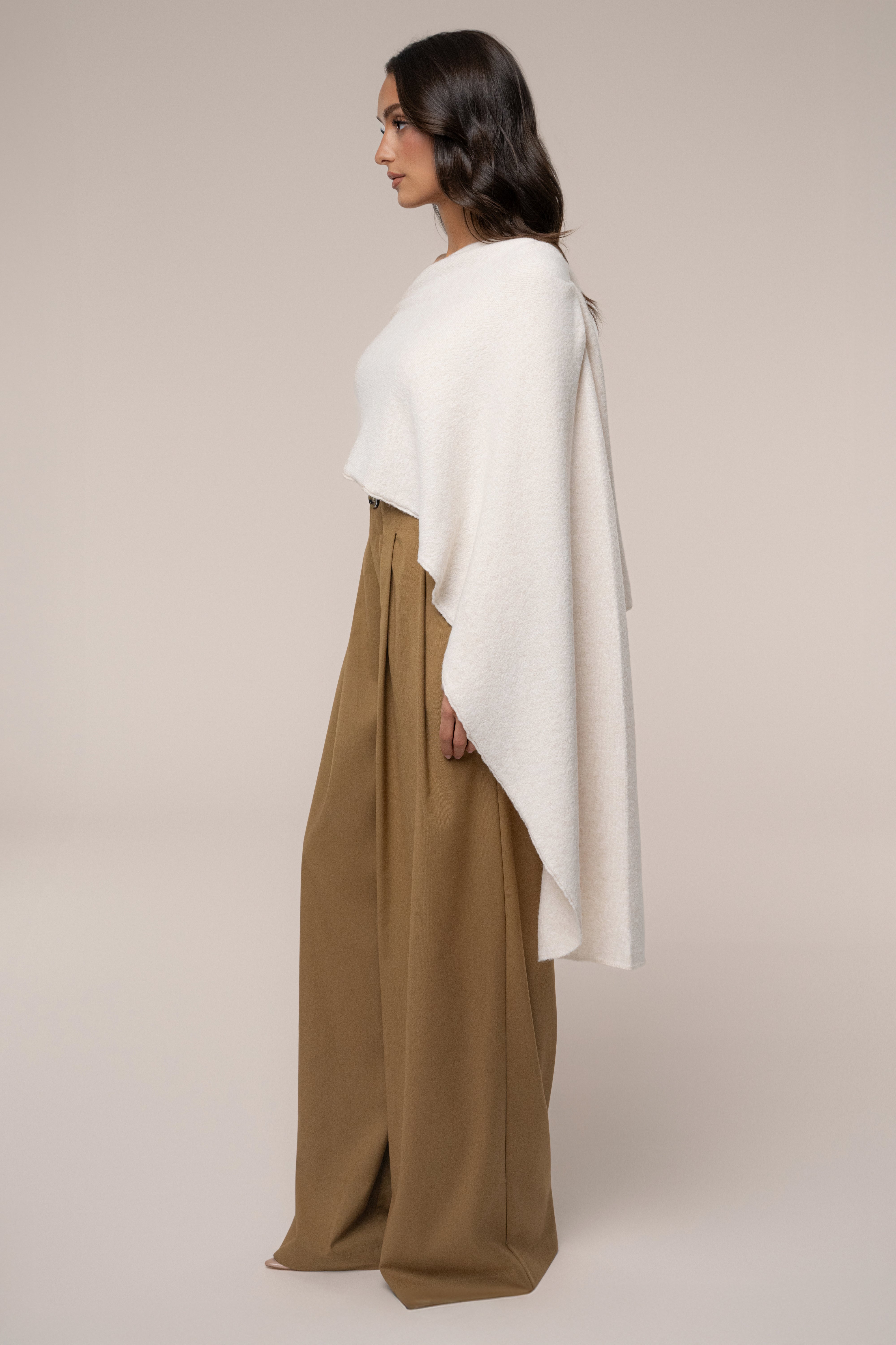 Ivory capsule one-shoulder top by JLUXLABEL, featuring a stylish and modern design with a single shoulder strap and sleek fit.