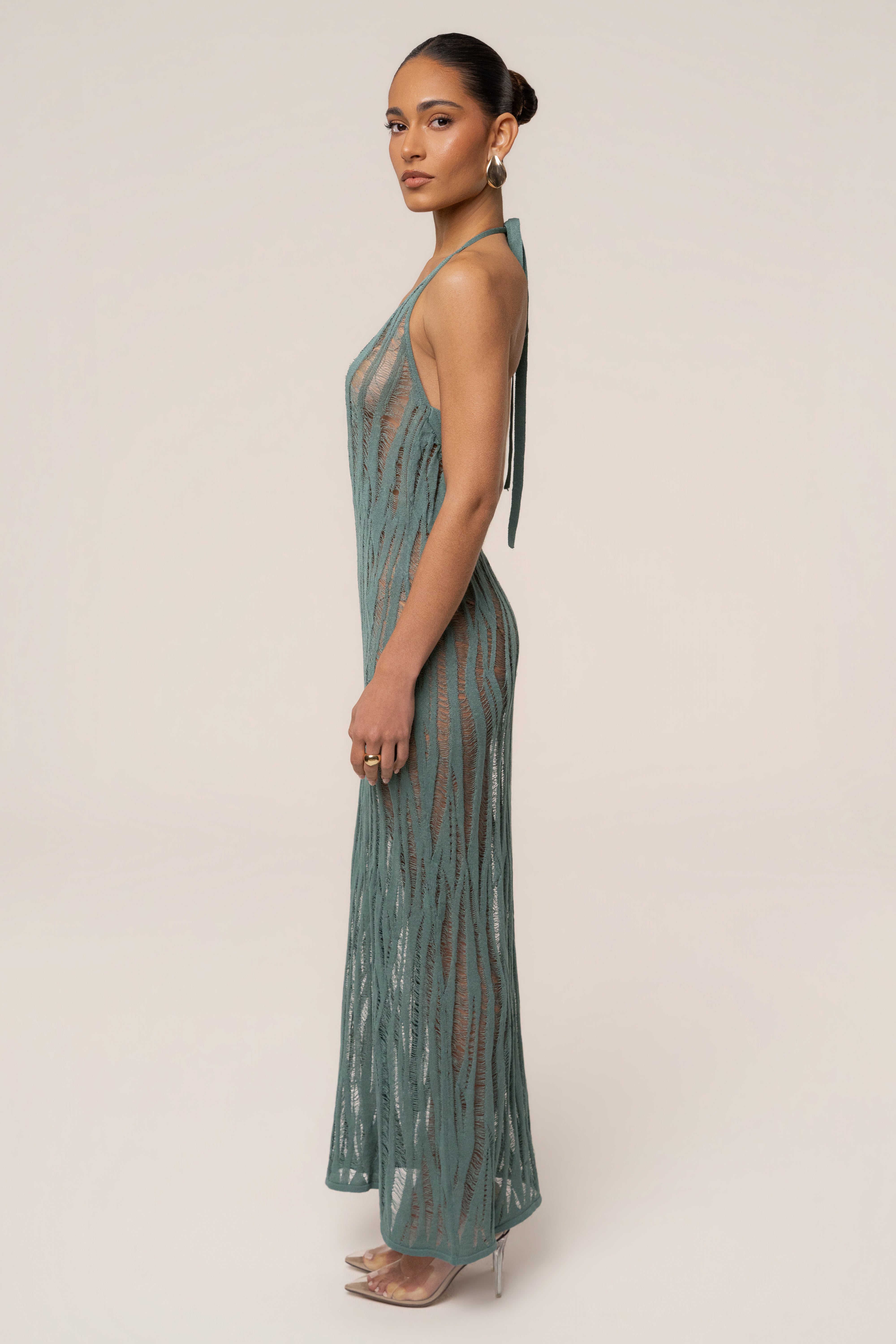 Dusty green Nocturnal Waves maxi dress by JLUXLABEL, flowing fabric with a stylish, relaxed fit, perfect for elegant occasions.