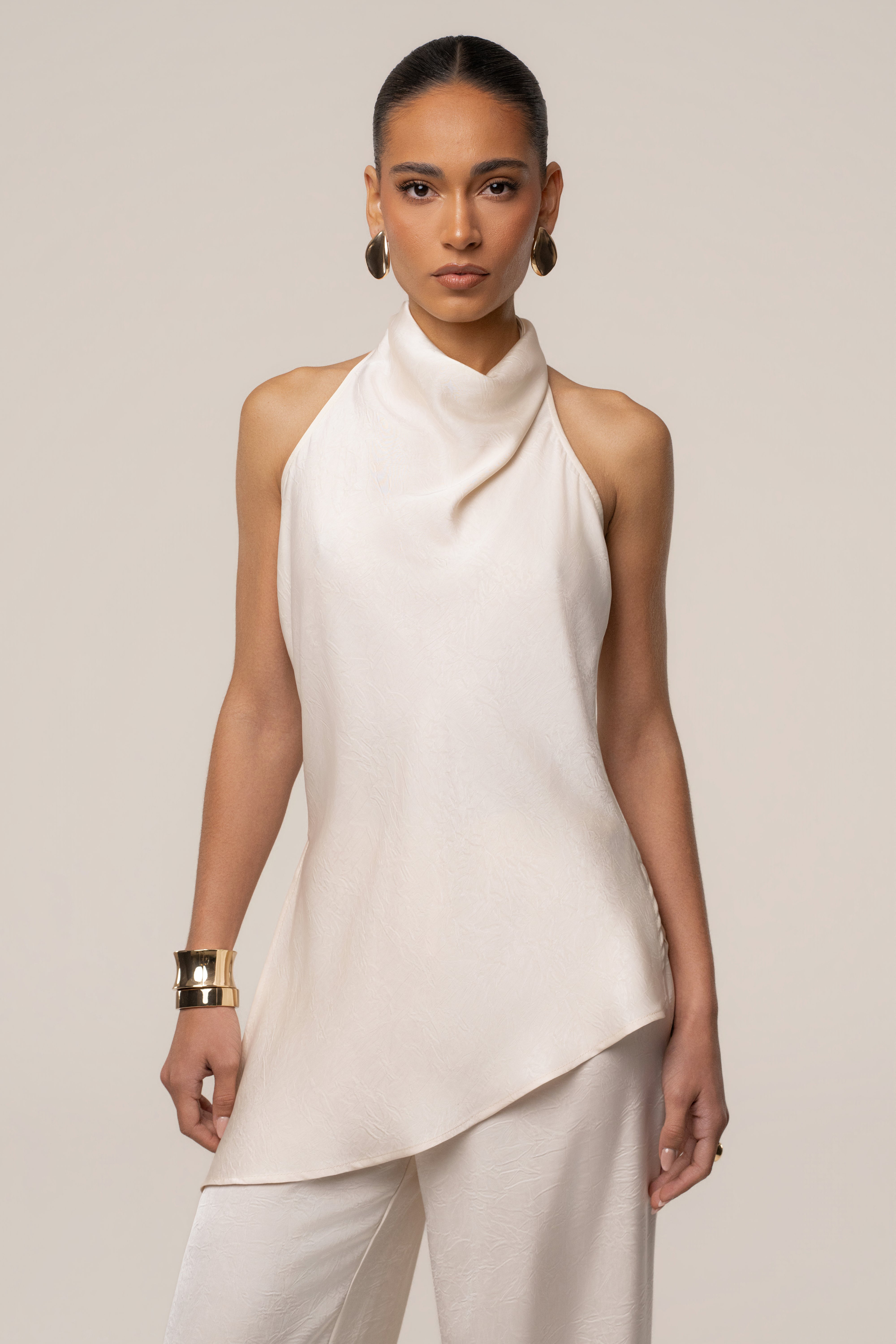 Cream satin pant set with draped design from JLUXLABEL, featuring a stylish and elegant coordinated outfit.