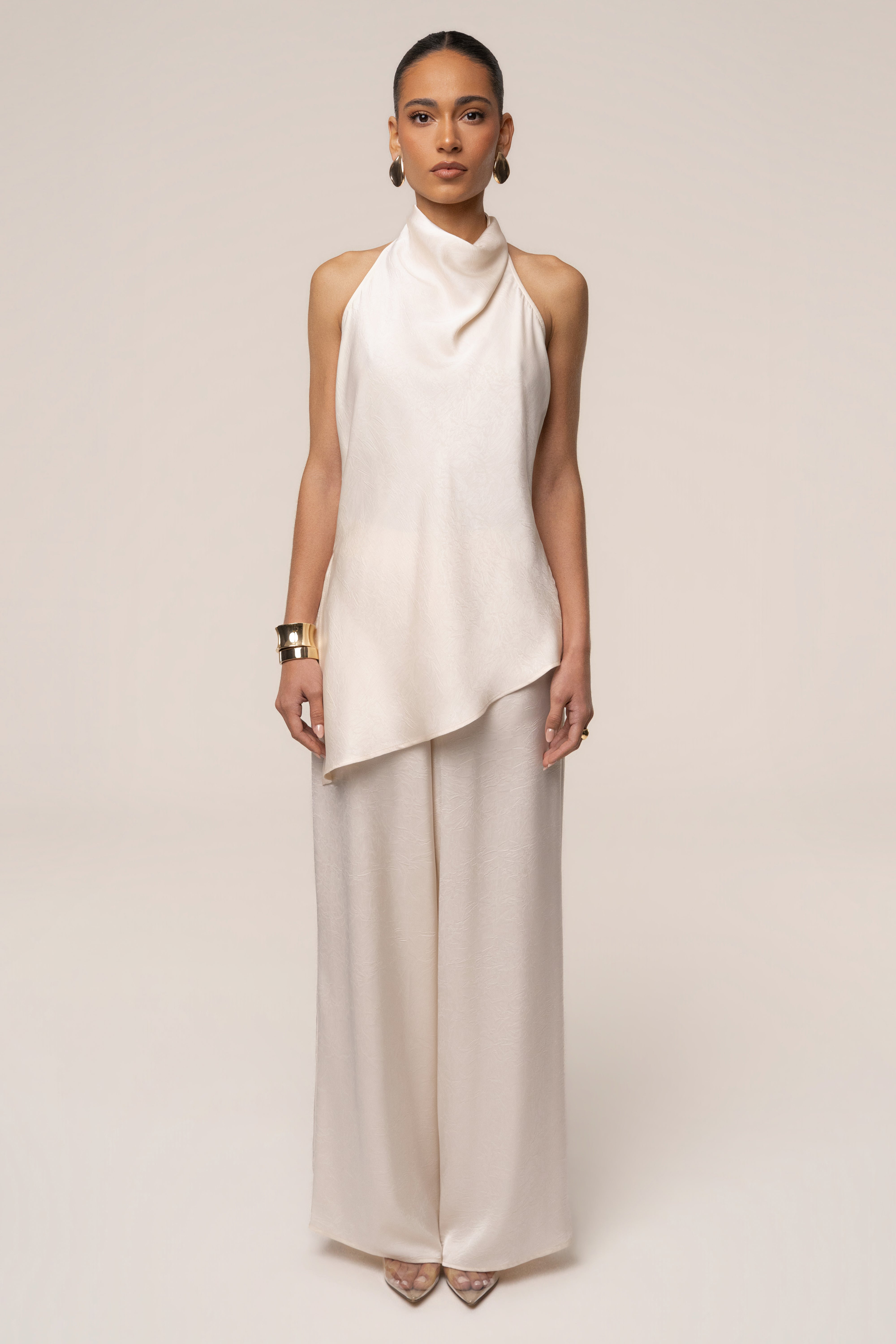Cream satin pant set with draped design from JLUXLABEL, featuring a stylish and elegant matching top and pants.