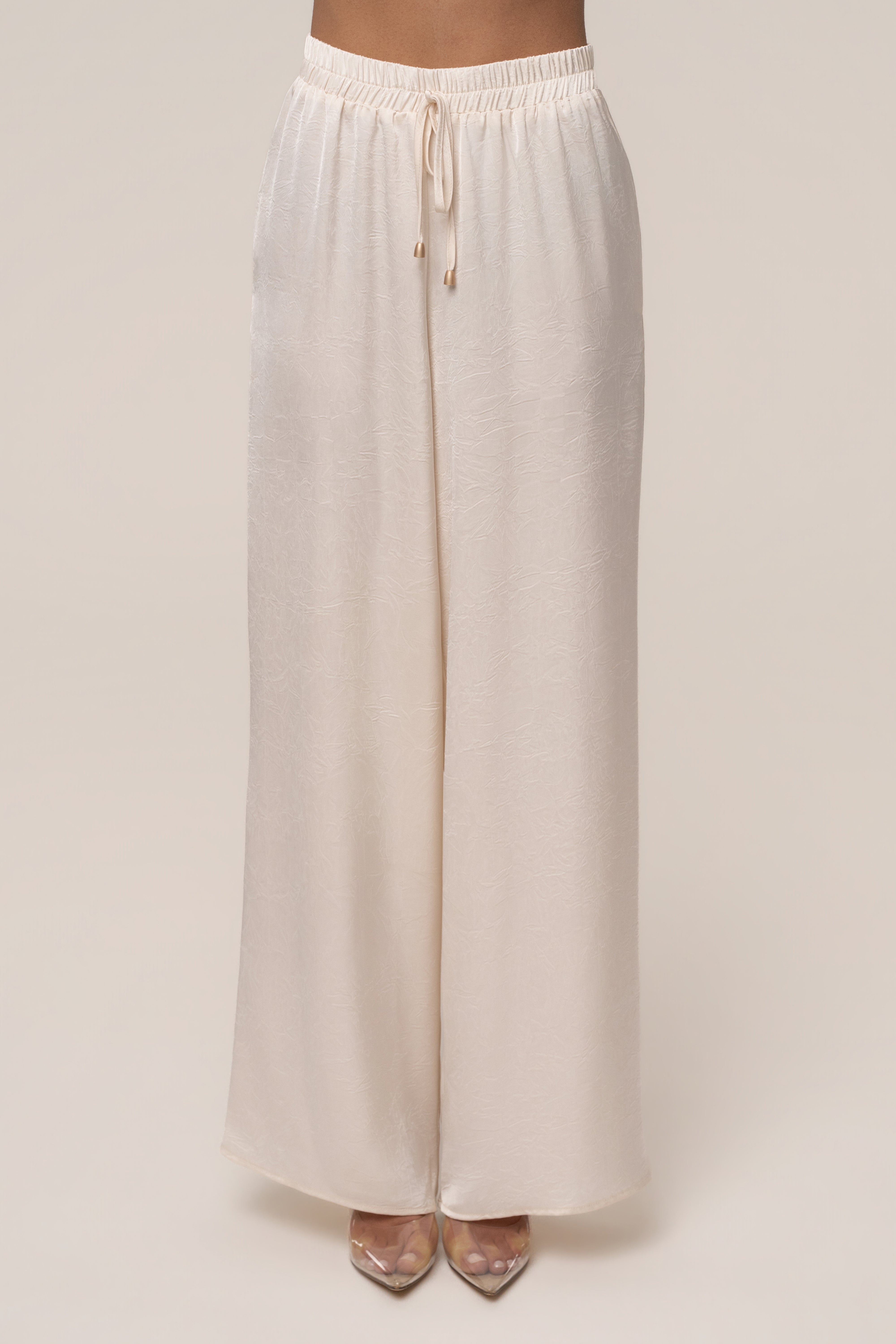 Cream satin pant set with draped design from JLUXLABEL, featuring a stylish, elegant coordinated ensemble.