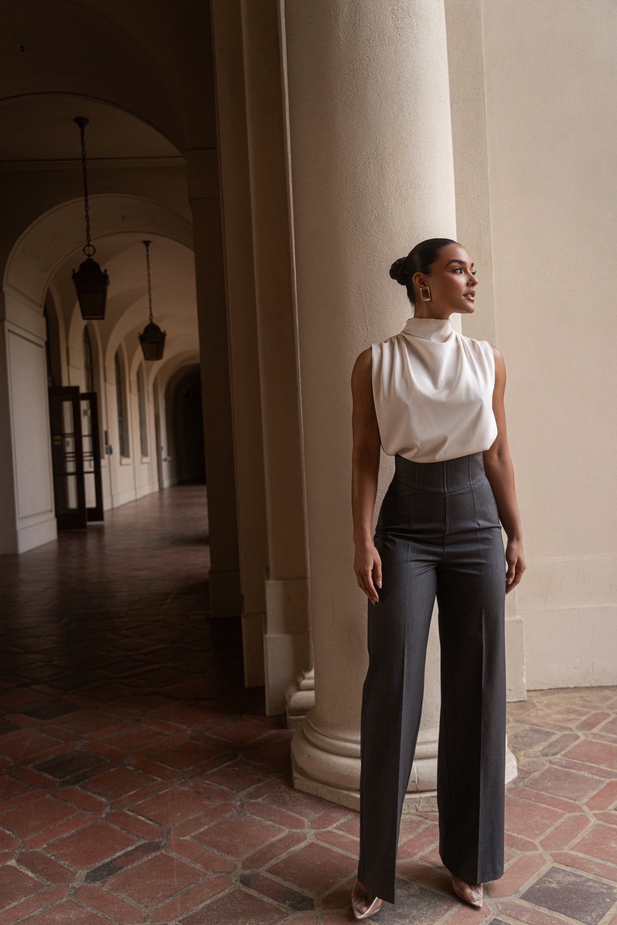 JLUXLABEL Buttercream Desiree mock neck top featuring a fitted silhouette and long sleeves, styled on a model.