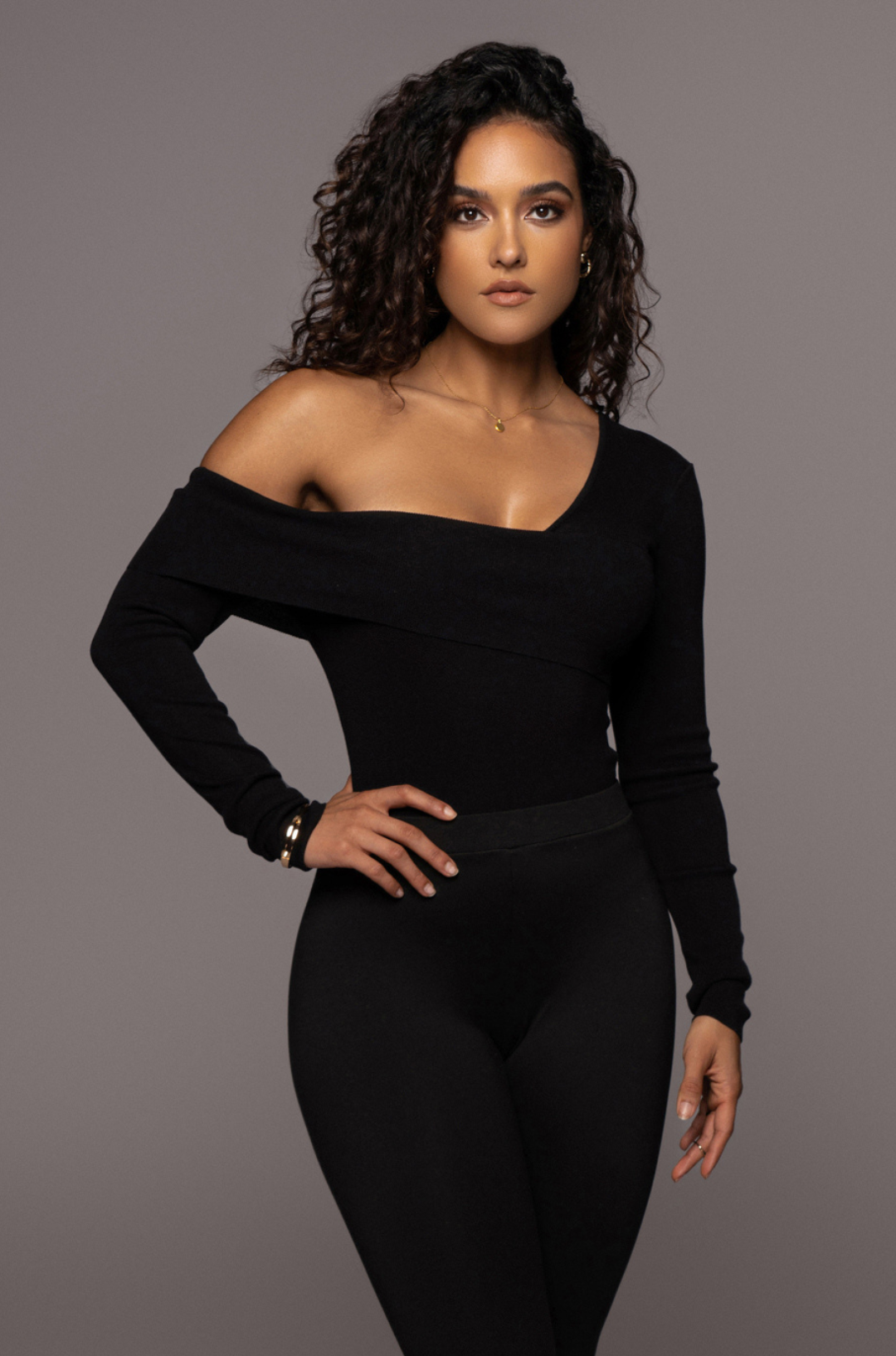 Black Eve off-the-shoulder top from JLUXLABEL, featuring a stylish neckline and casual fit, ideal for trendy summer outfits.