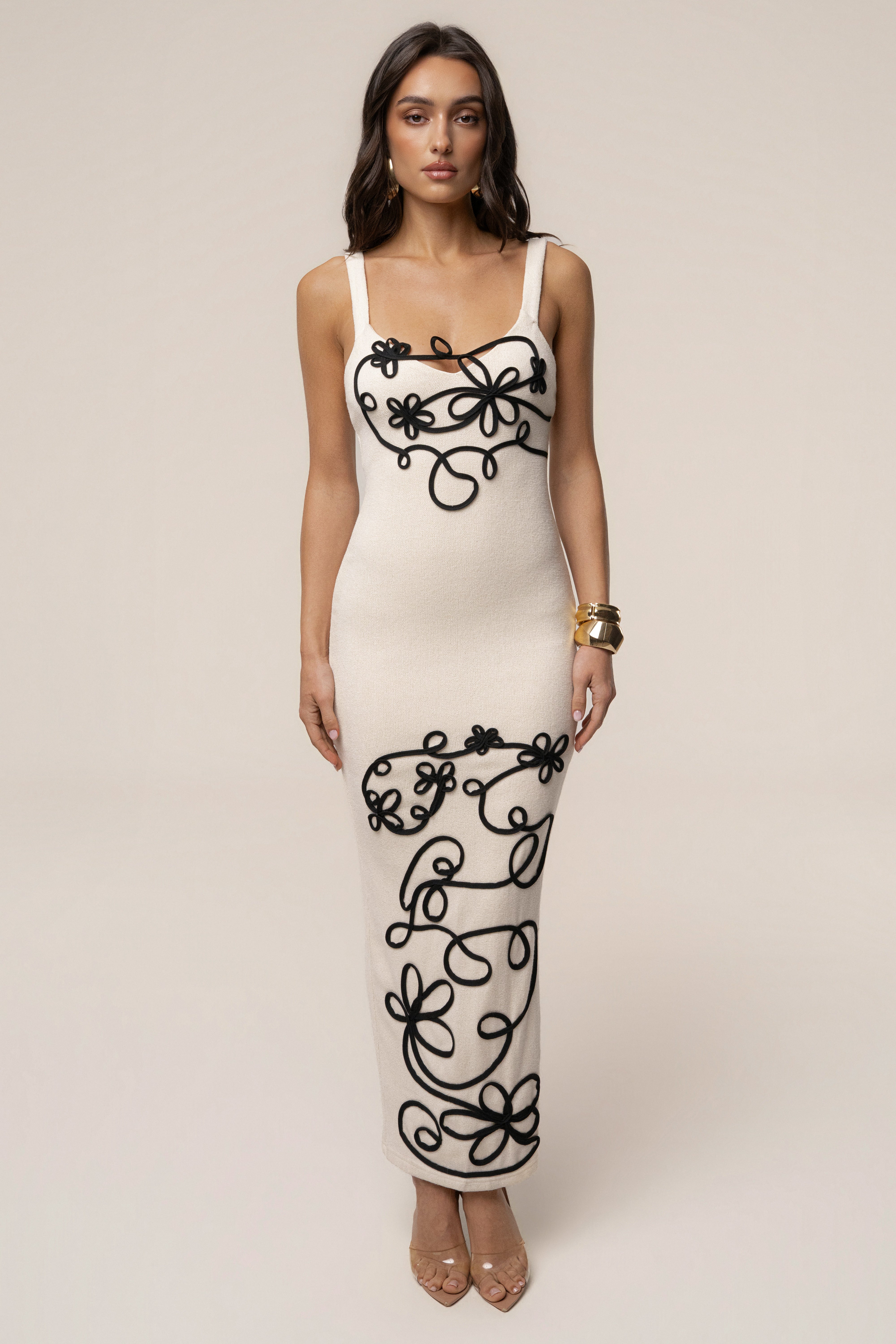 Ivory petal embroidered midi dress by JLUXLABEL showing delicate floral embroidery and elegant flowy fabric.