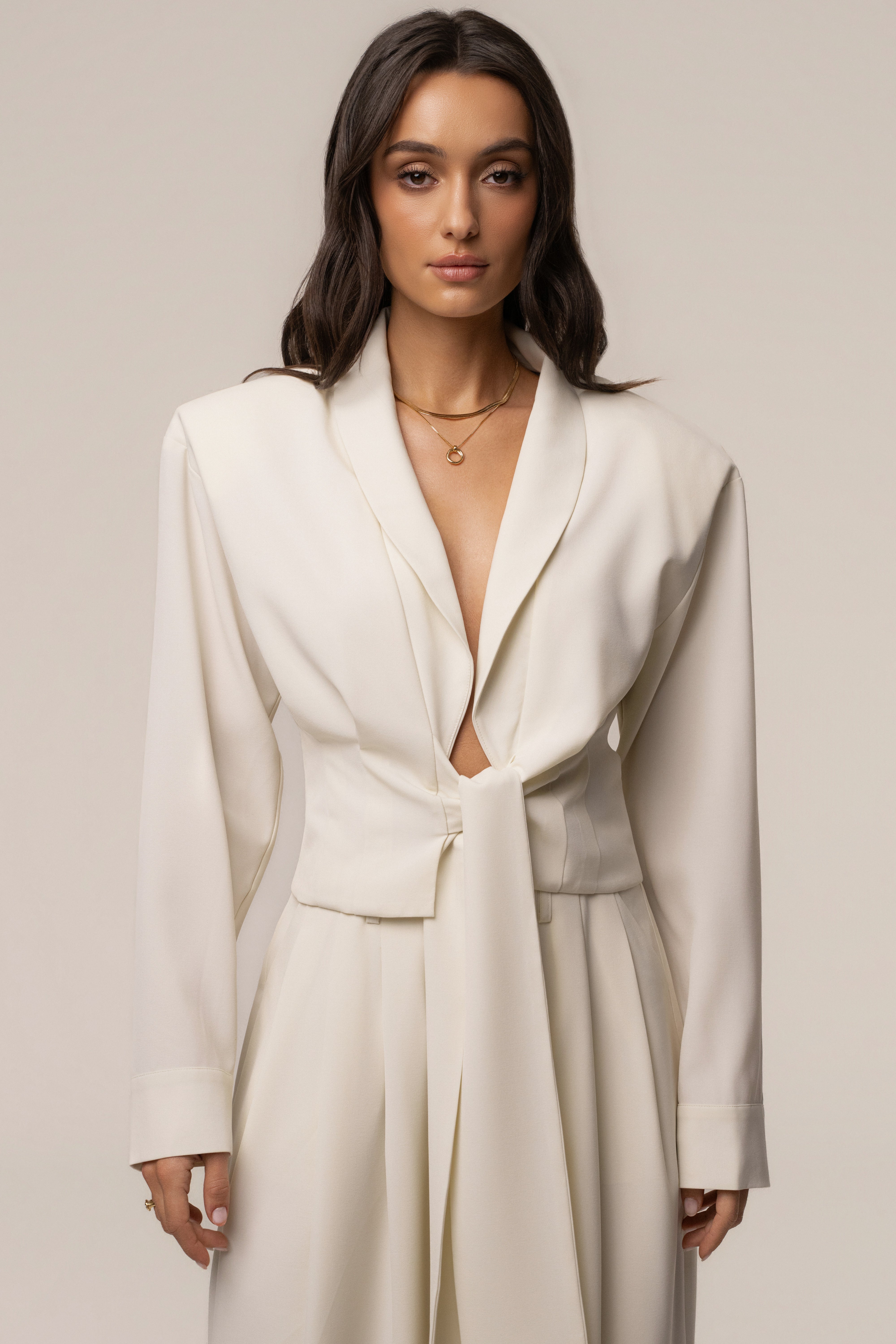 Cream Estate Wrap Top from JLUXLABEL, showing front view with fitted design and elegant wrap detail.