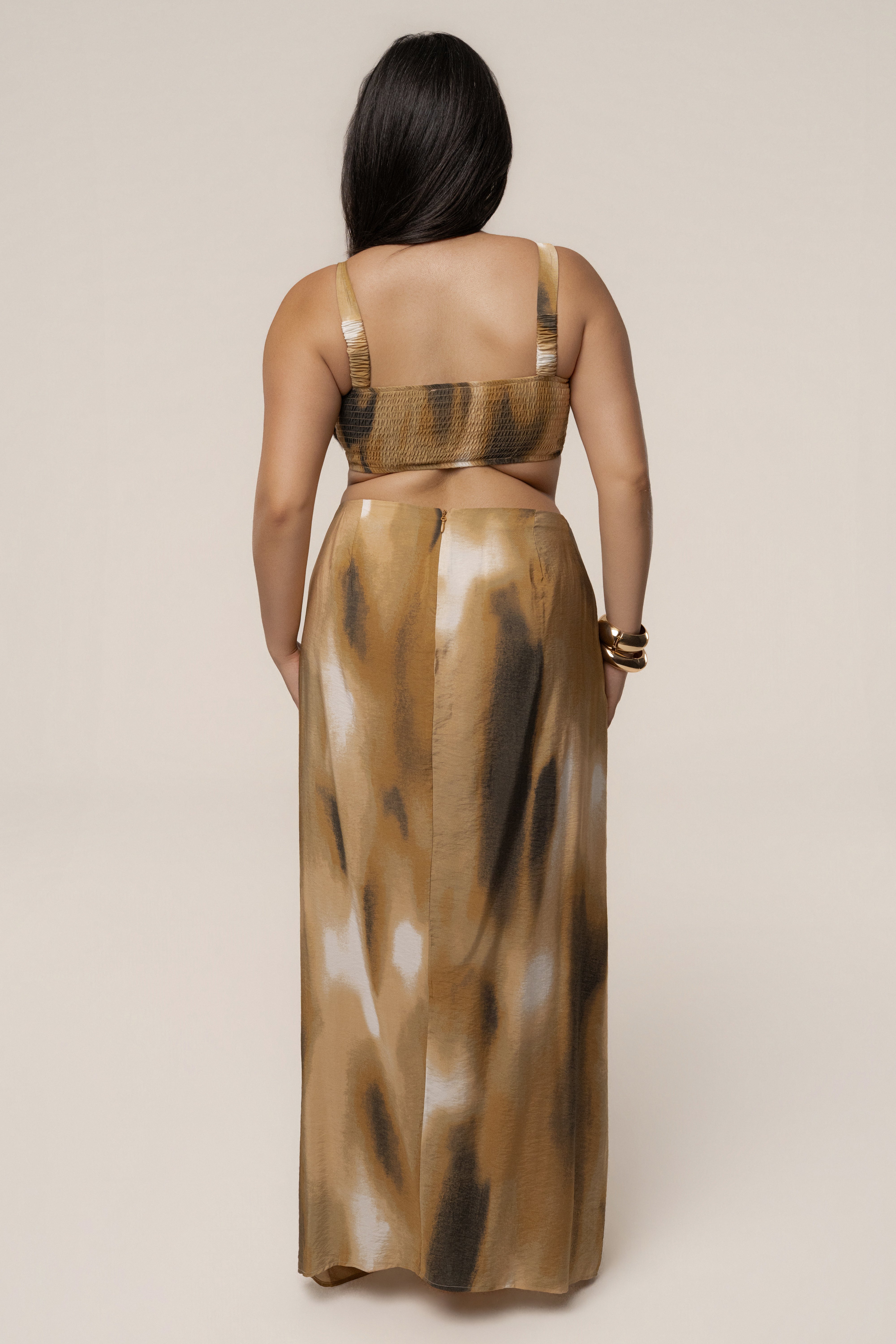 Brown flowing maxi skirt from JLUXLABEL, elegant design with a relaxed fit, showcased layered and styled for a chic look.
