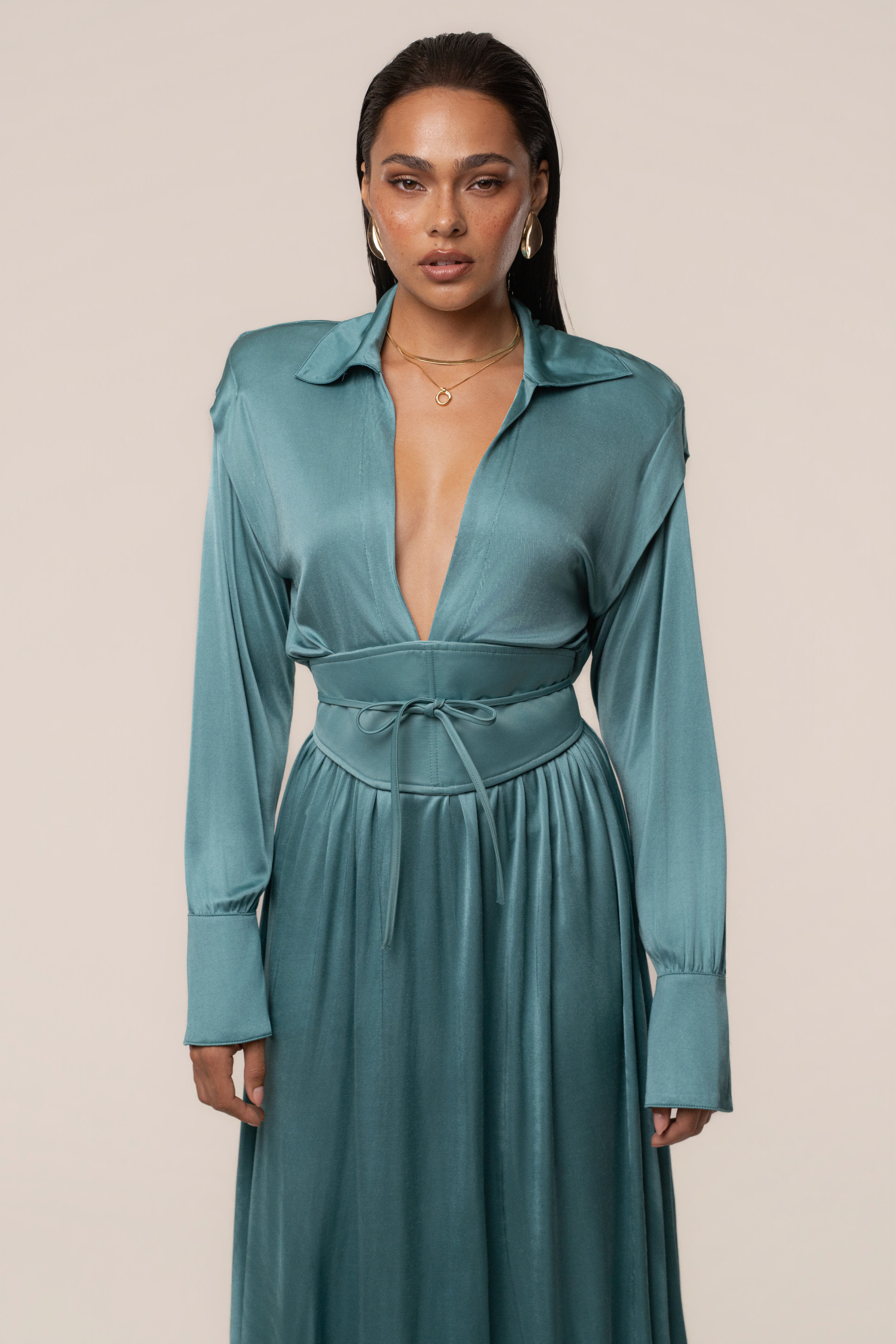 Teal high line collar maxi dress by JLUXLABEL featuring a sleek, elegant design with a fitted bodice and flowing skirt.