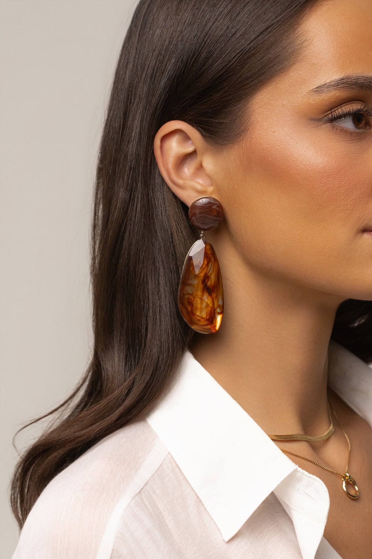 Brown Estelle Marble Earrings by JLUXLABEL featuring gold-tone jewelry with marbled brown and beige stone accents.
