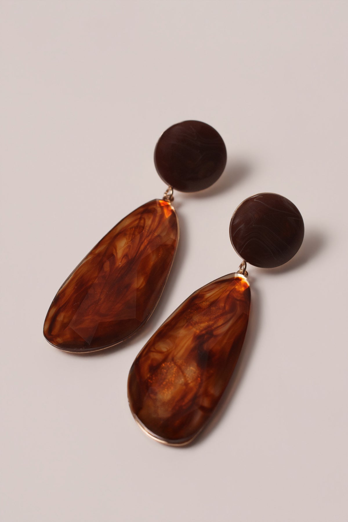 Brown Estelle marble earrings by JLUXLABEL, showcasing elegant jewelry with round marble stones and gold-tone accents.