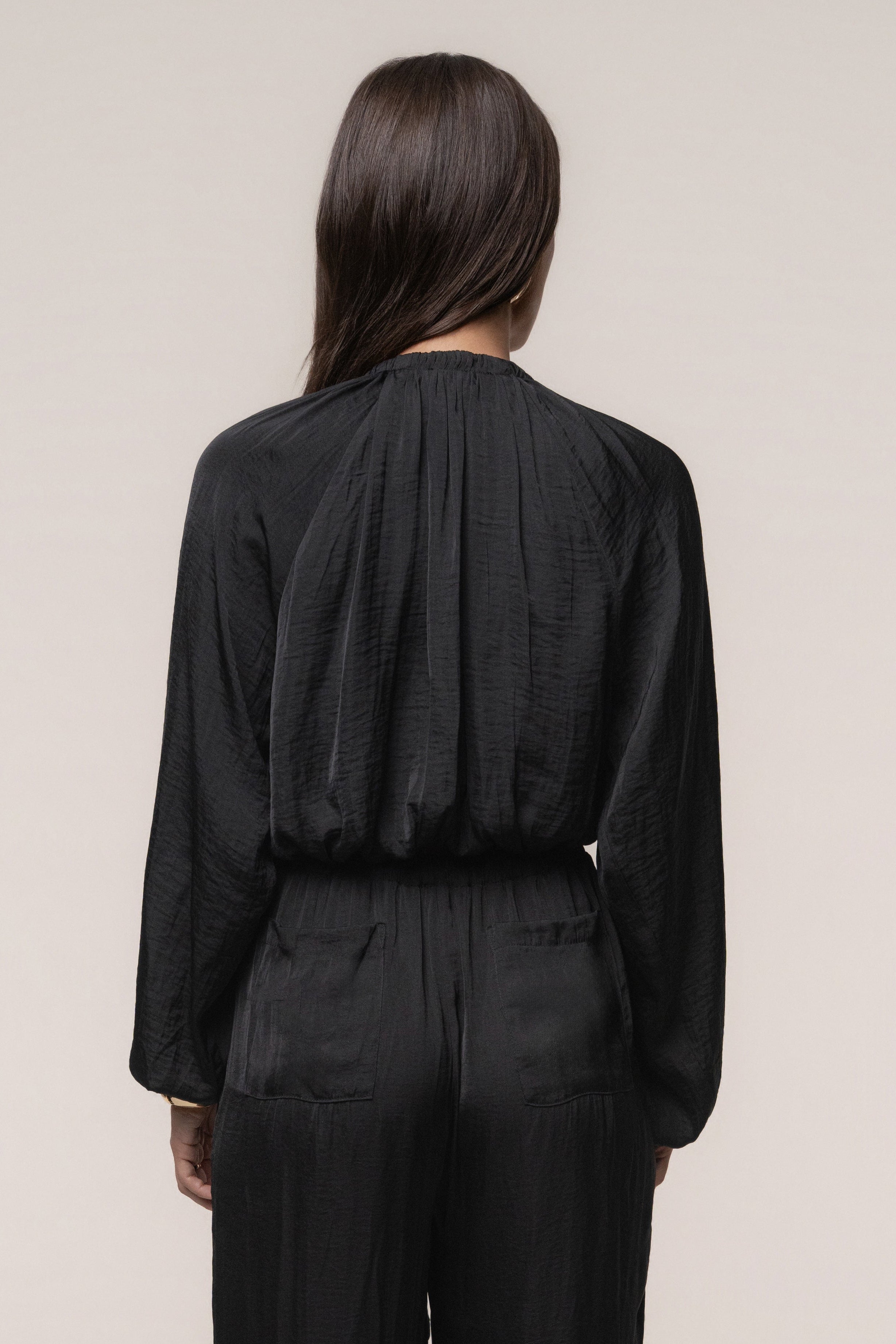 Black Seaside Glow Top by JLUXLABEL, stylish sleeveless top with a relaxed fit and seaside-inspired design, perfect for casual wear.