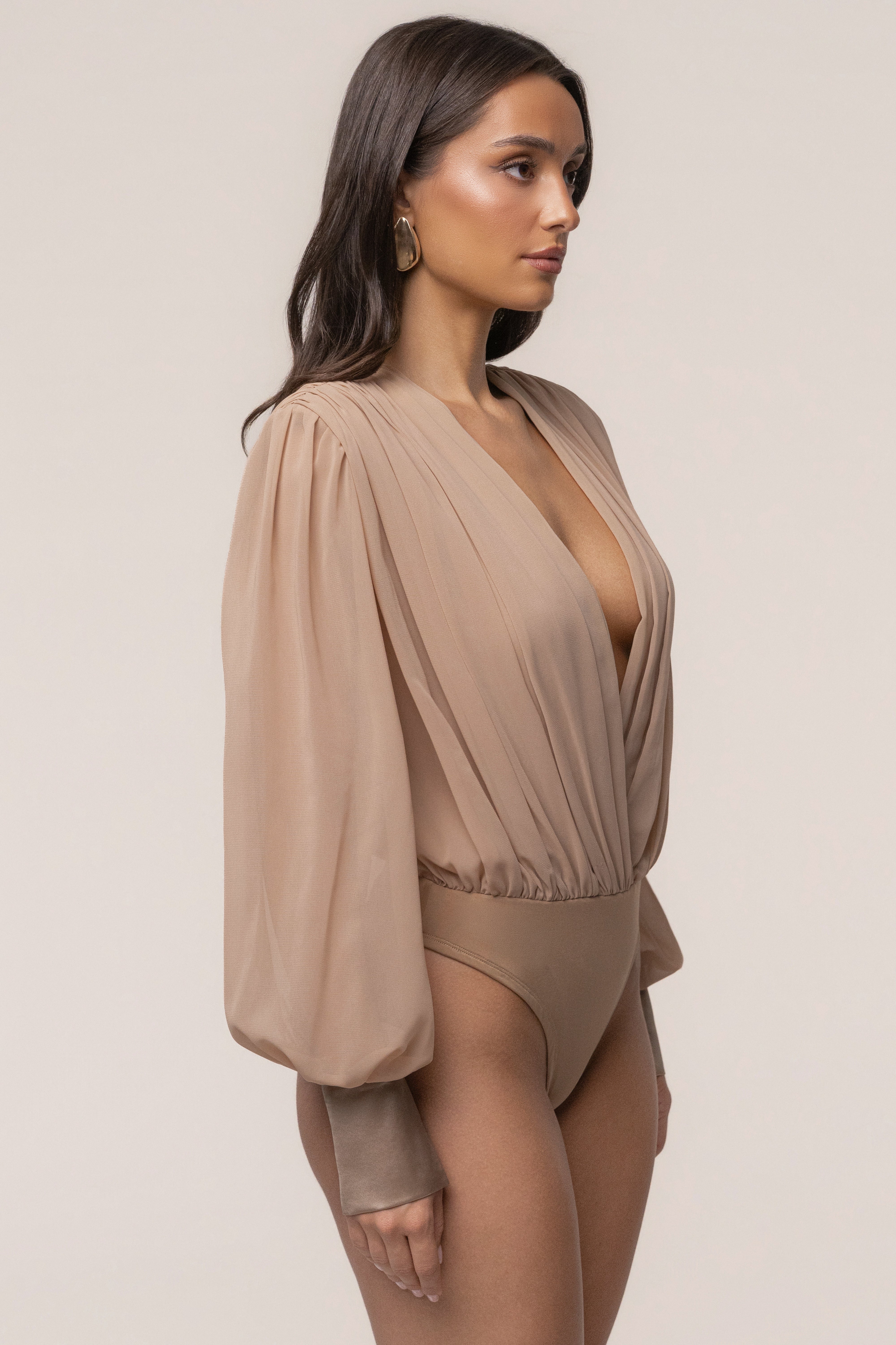 Tan JLUXLABEL pleated chiffon top with refined design, featuring a flowy, lightweight fabric and elegant pleats.