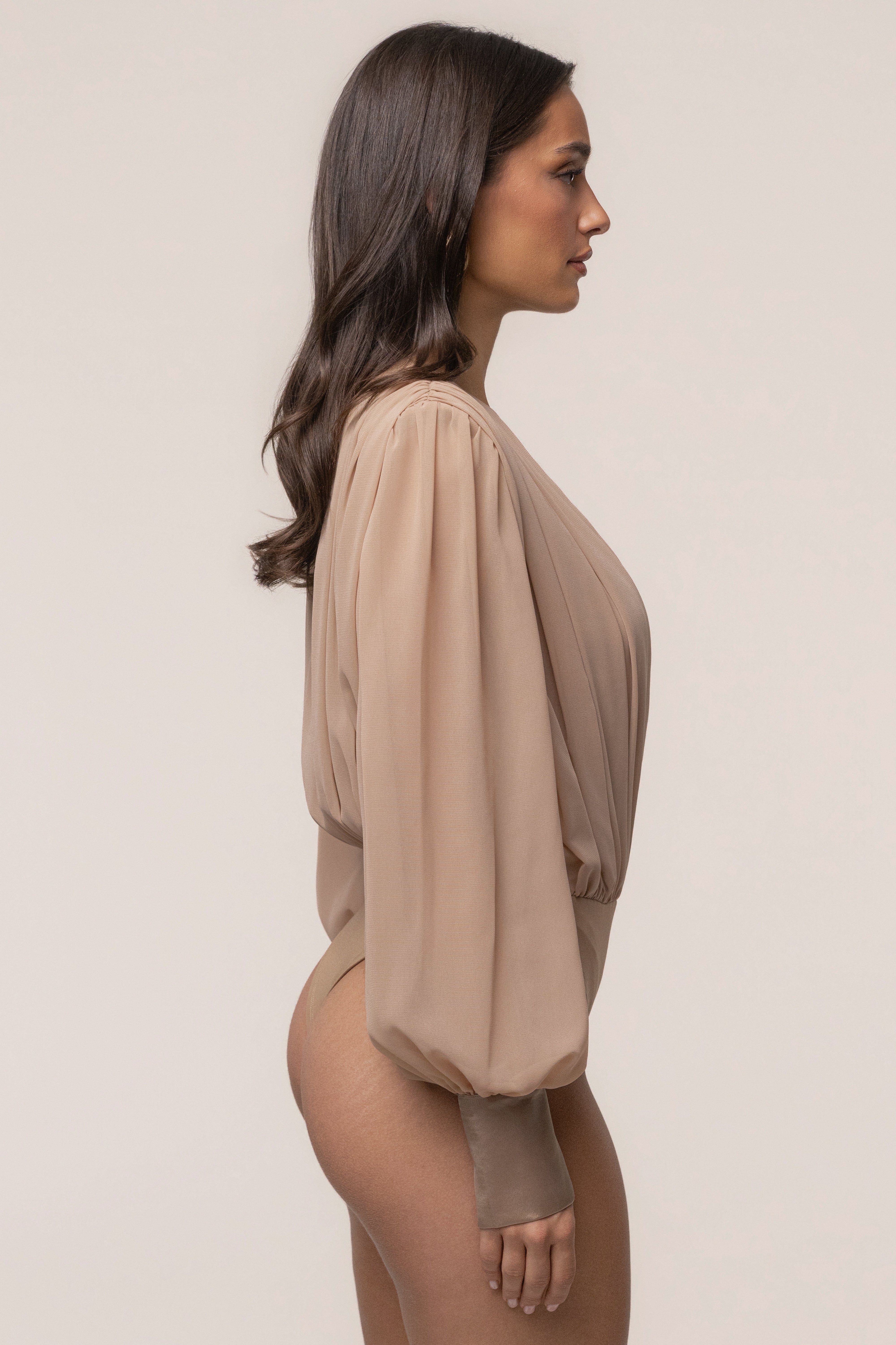 Tan JLUXLABEL pleated chiffon top with refined design, featuring a flowy silhouette and elegant pleats.