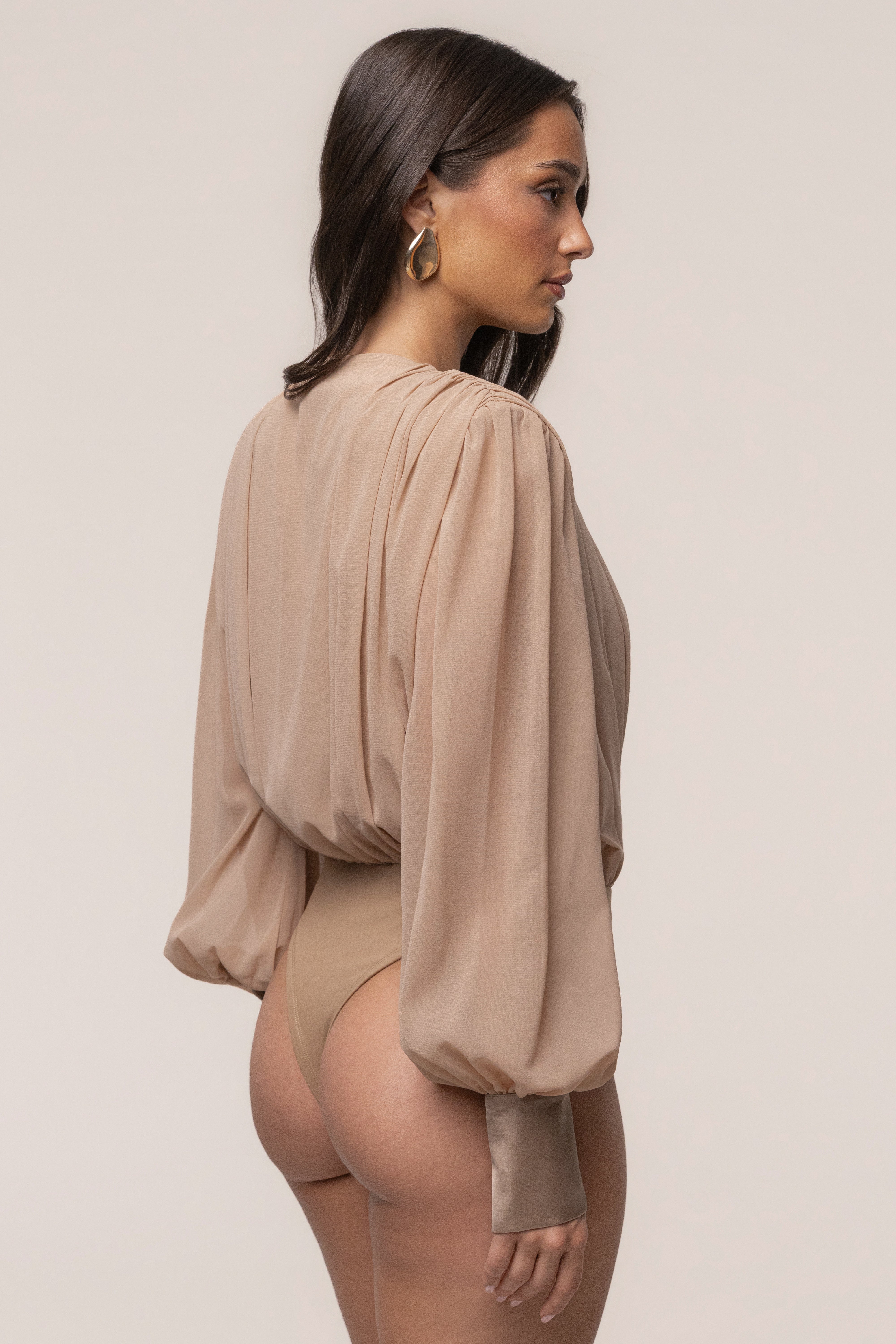 Tan refined pleated chiffon top by JLUXLABEL, featuring elegant pleats and lightweight fabric, perfect for stylish everyday wear.