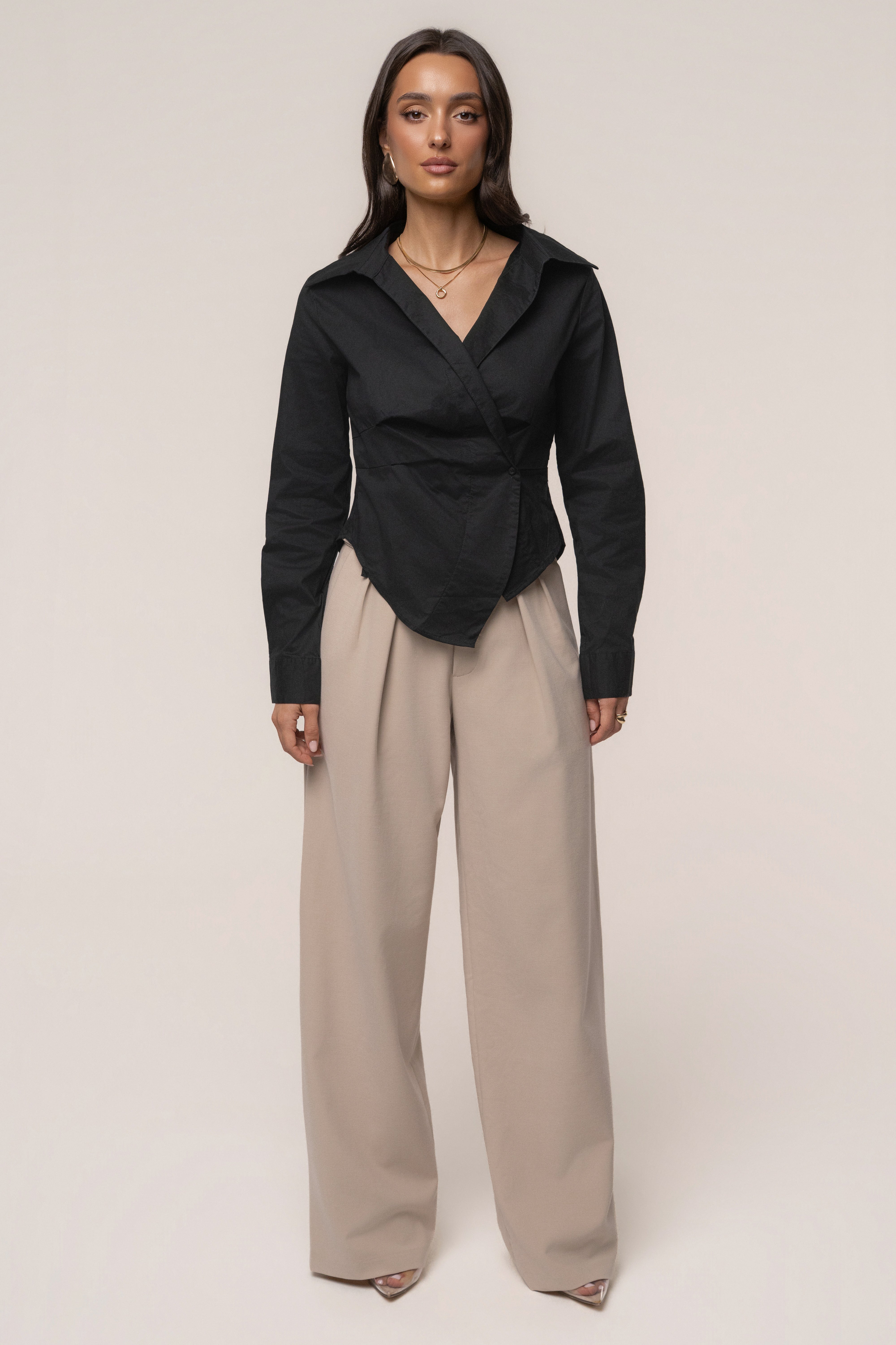 Black Sculpt and Form blouse by JLUXLABEL, front view showing fitted design and stylish neckline.