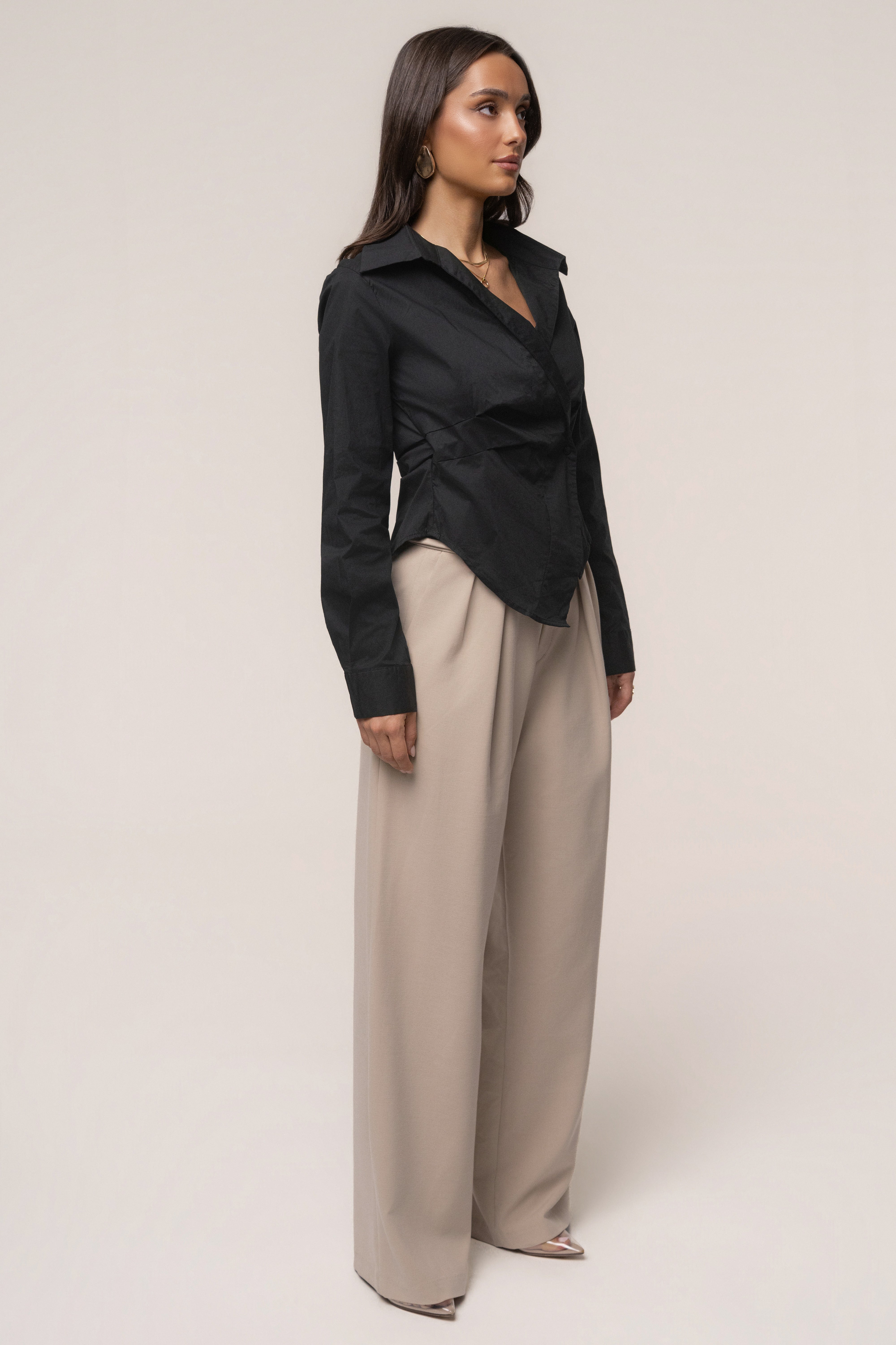 Black Sculpt and Form blouse by JLUXLABEL, showcasing a stylish, fitted top with a sleek design and structured silhouette.