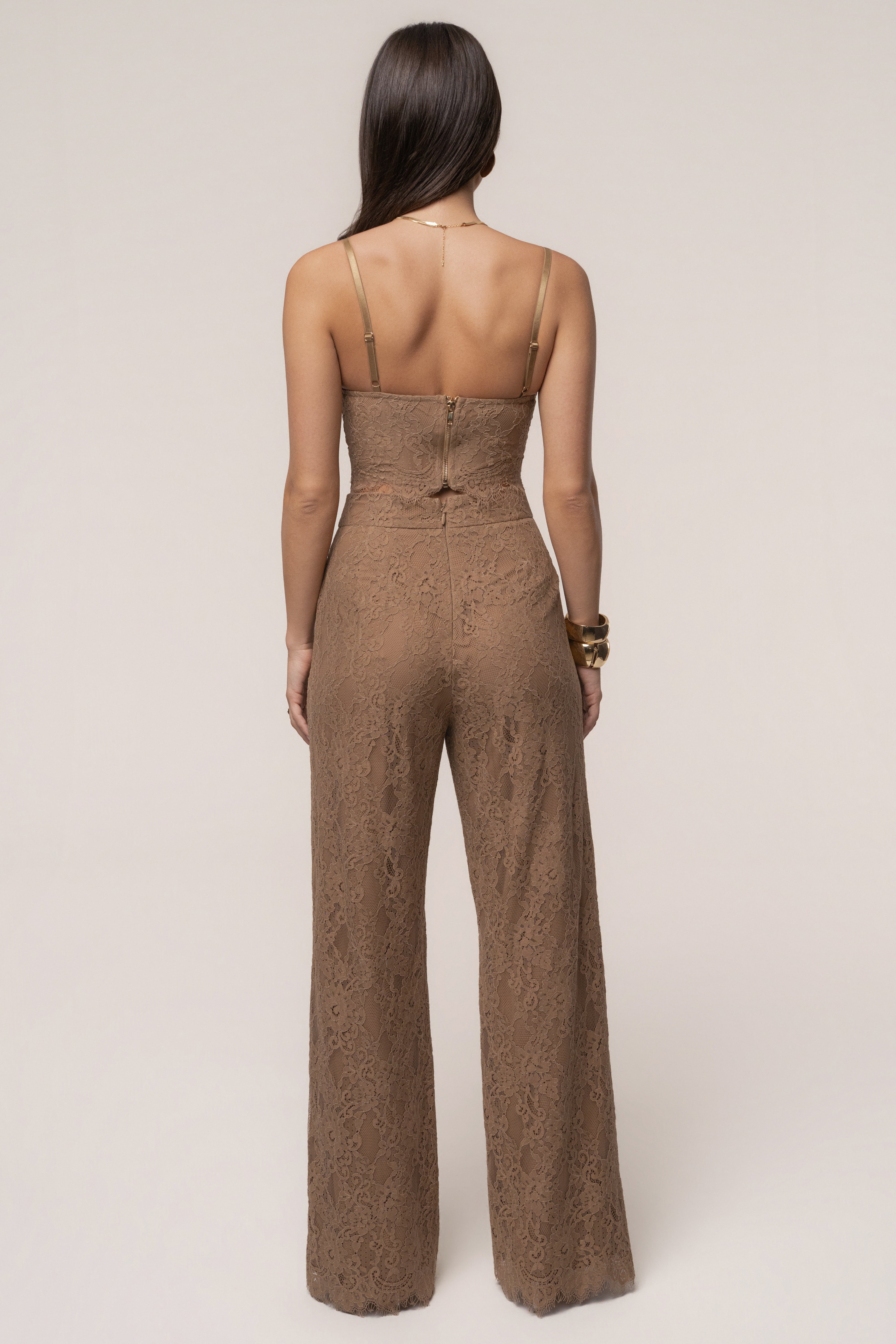 Tan JLUXLABEL Forever Crush Lace Pant bottoms with intricate lace details and a comfortable fit, shown on a model.