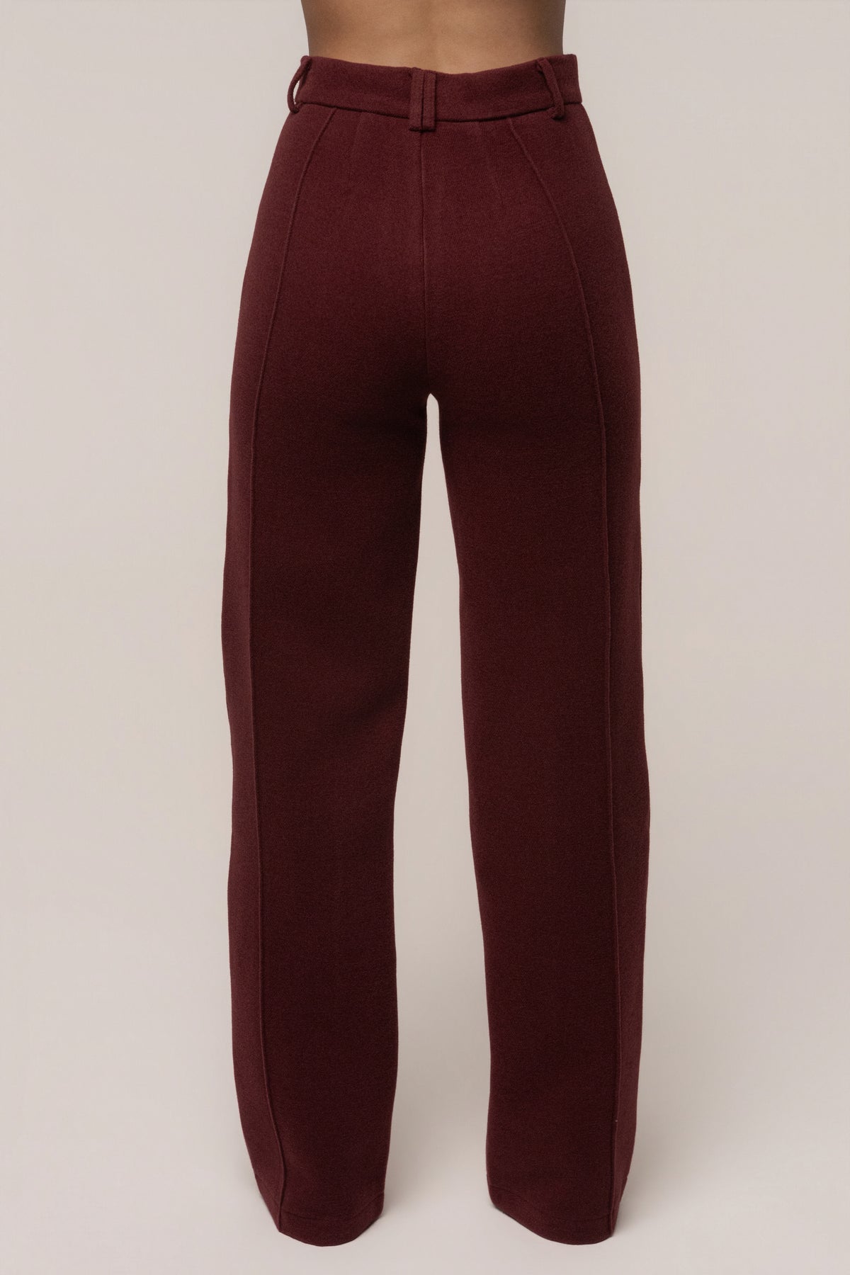 Burgundy JLUXLABEL Stay Sharp Trouser shown on a model, featuring tailored fit and sleek design for stylish bottoms.
