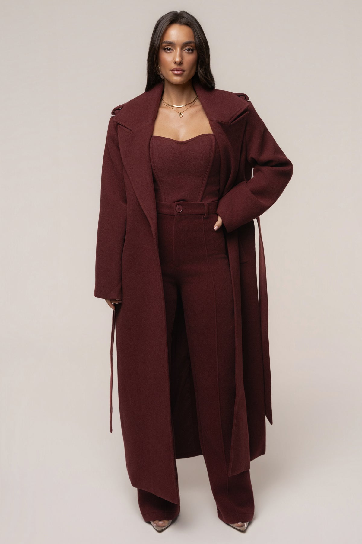 Burgundy JLUXLABEL Savannah belted coat, stylish outerwear with a tailored fit and classic design, shown on a model.
