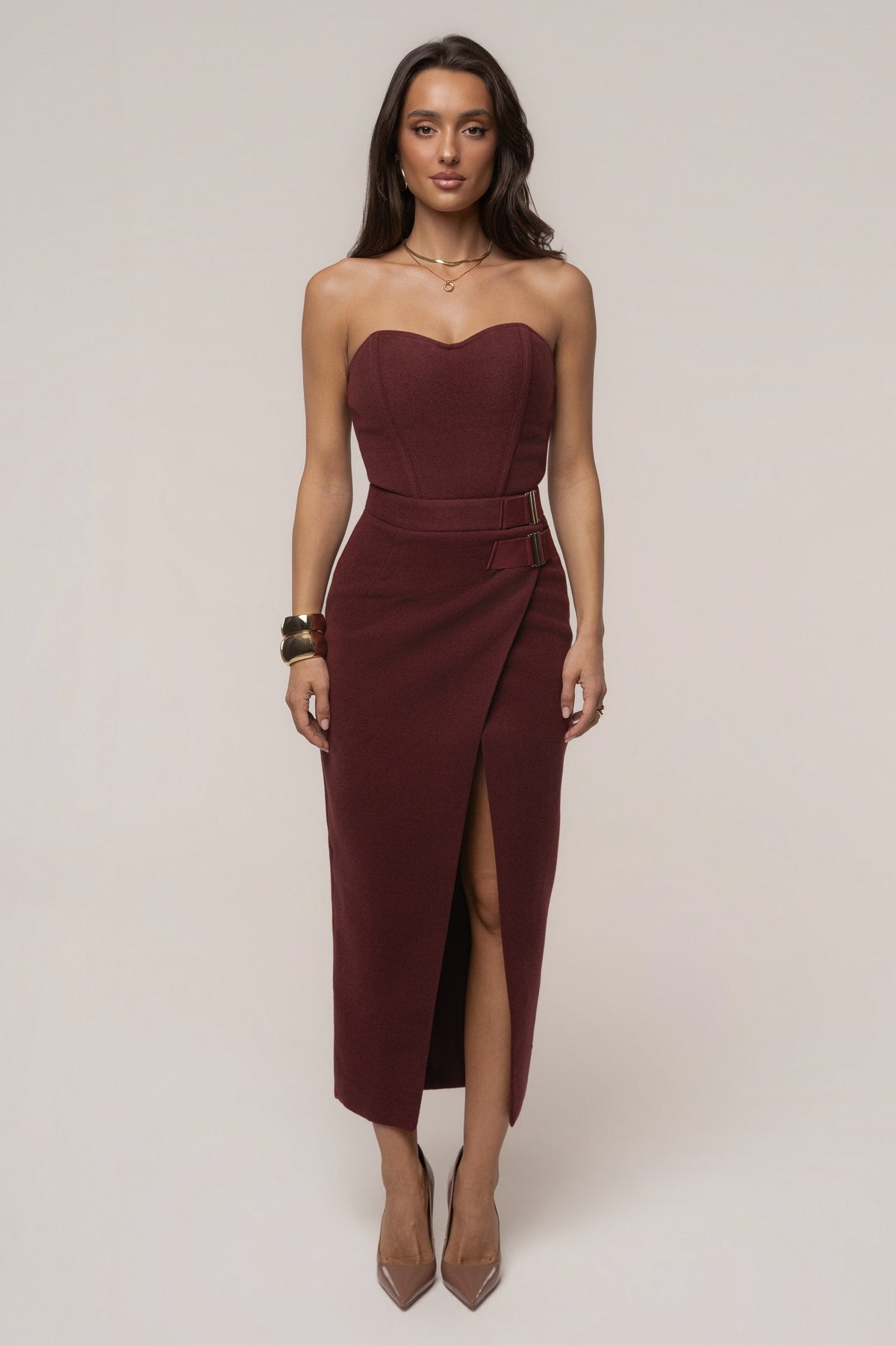 Burgundy Gisele slit skirt by JLUXLABEL, shown as a stylish women's bottoms with a high slit detail and fitted waist.
