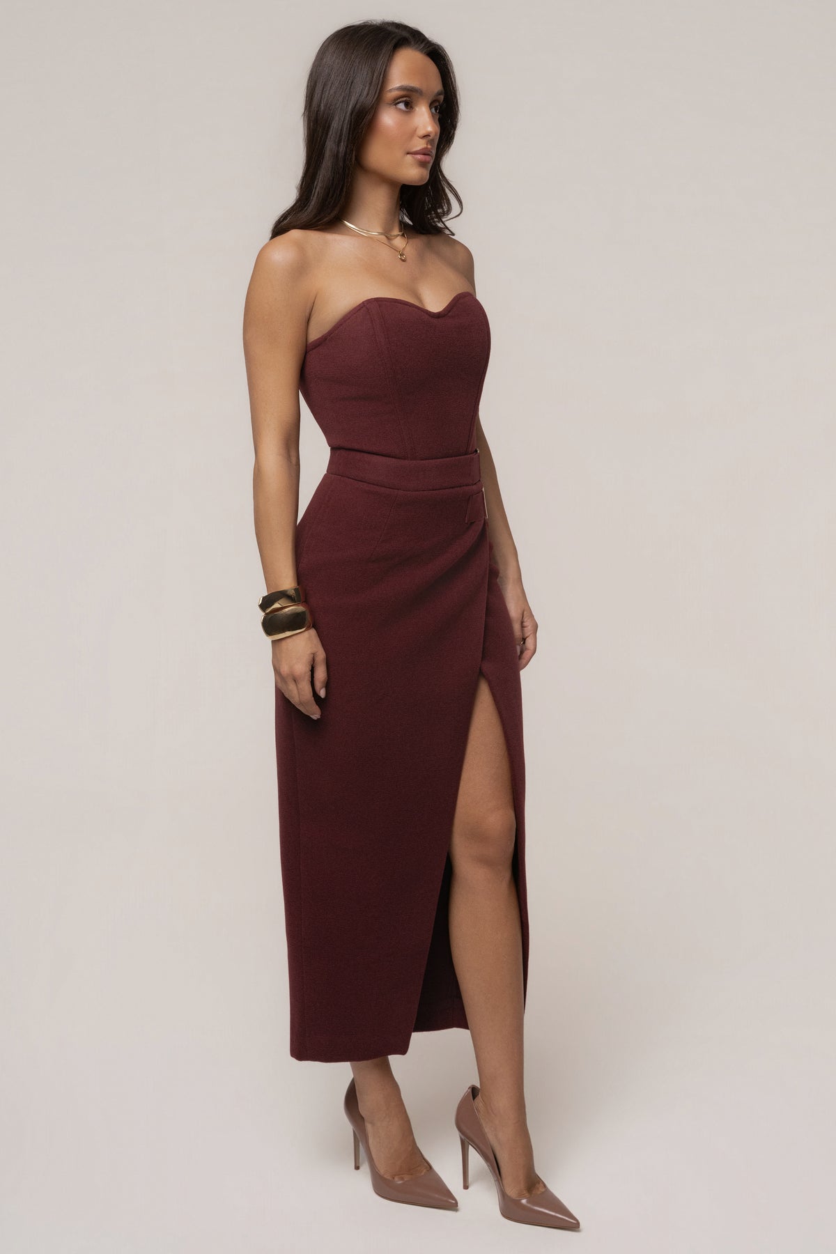 Burgundy Gisele slit skirt from JLUXLABEL, stylish women's bottoms with a high slit and fitted waist, perfect for elegant looks.