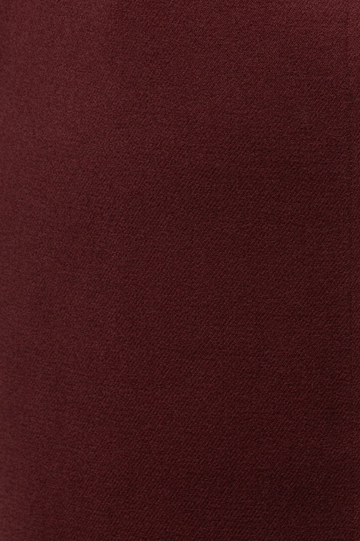 Burgundy Gisele slit skirt from JLUXLABEL, stylish women's bottoms with a side slit, shown on a model.