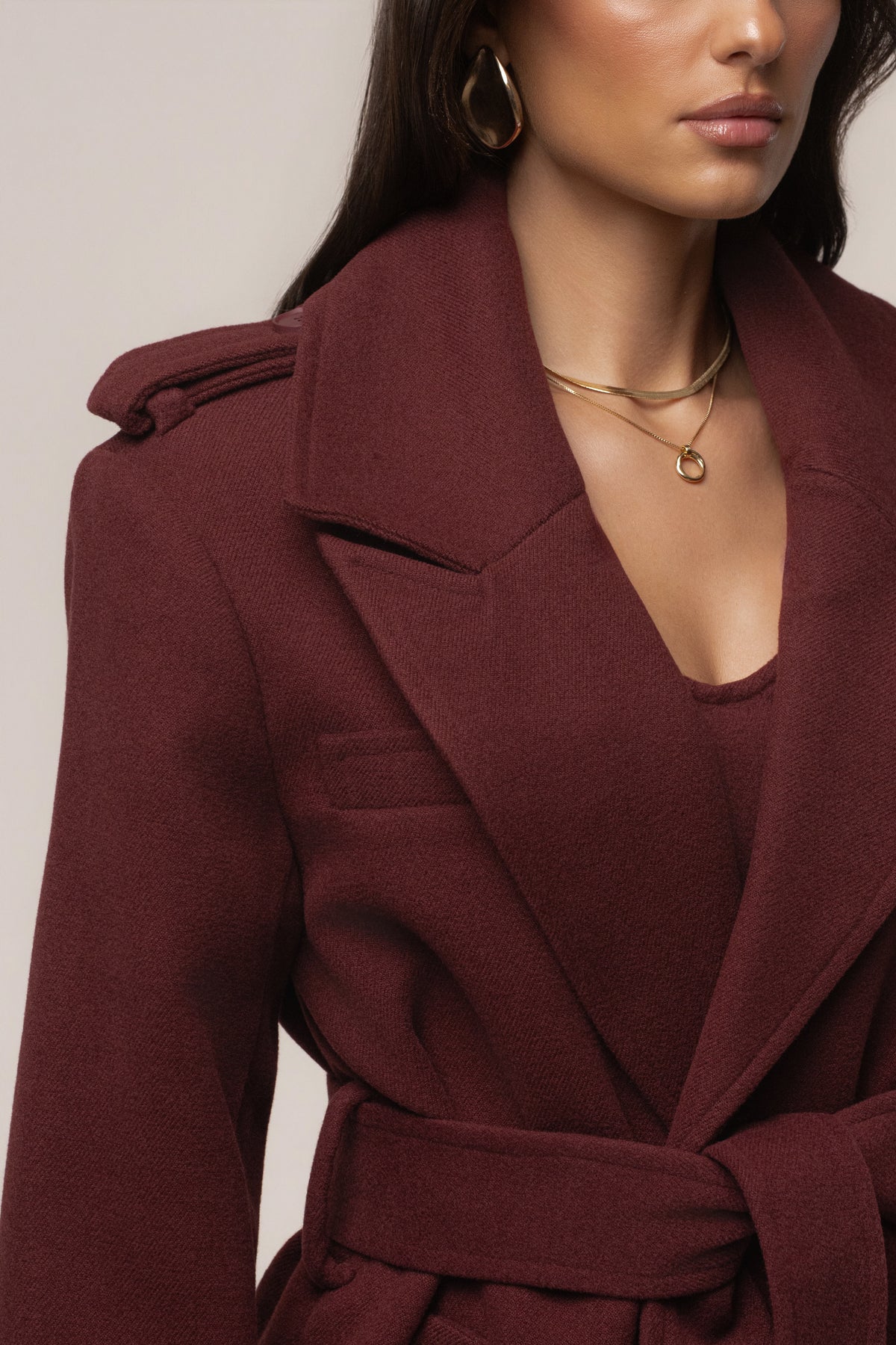 Burgundy JLUXLABEL Savannah belted coat, stylish outerwear with a tailored fit and classic design, shown on a model.