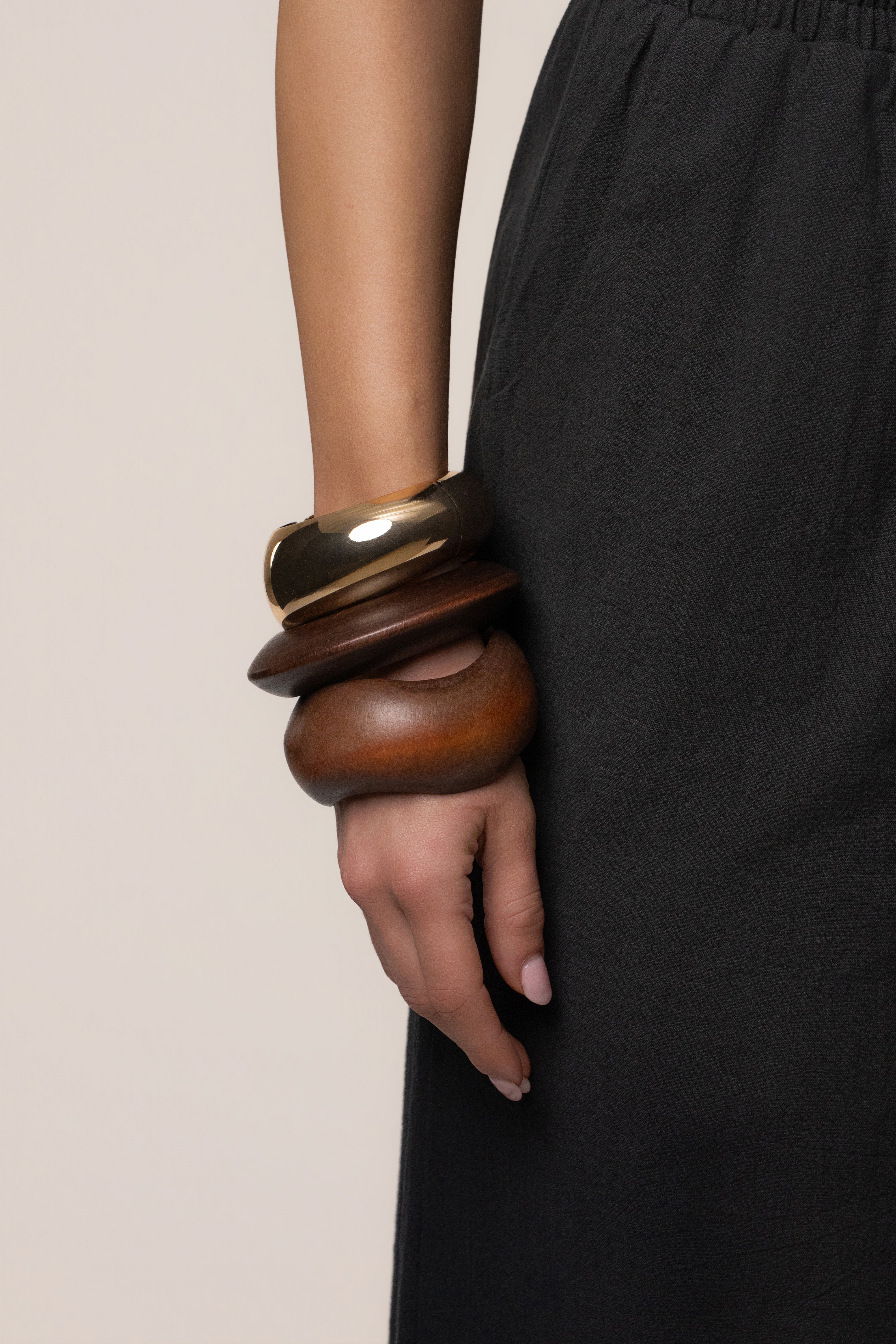 Gold Kora bracelet set by JLUXLABEL featuring multiple delicate gold jewelry pieces with intricate designs.