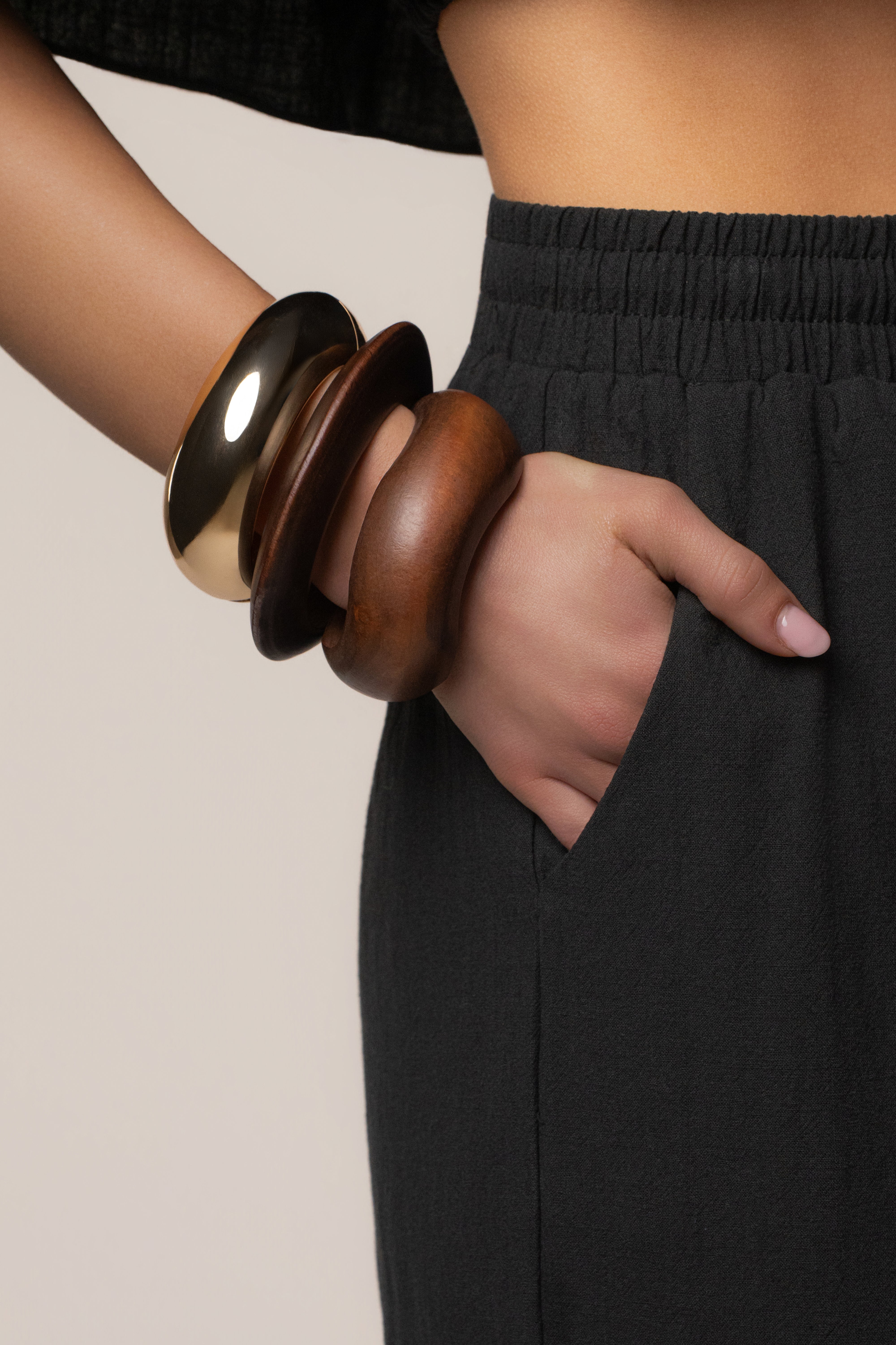 Gold Kora bracelet set by JLUXLABEL featuring multiple delicate gold jewelry pieces with intricate Kora designs.