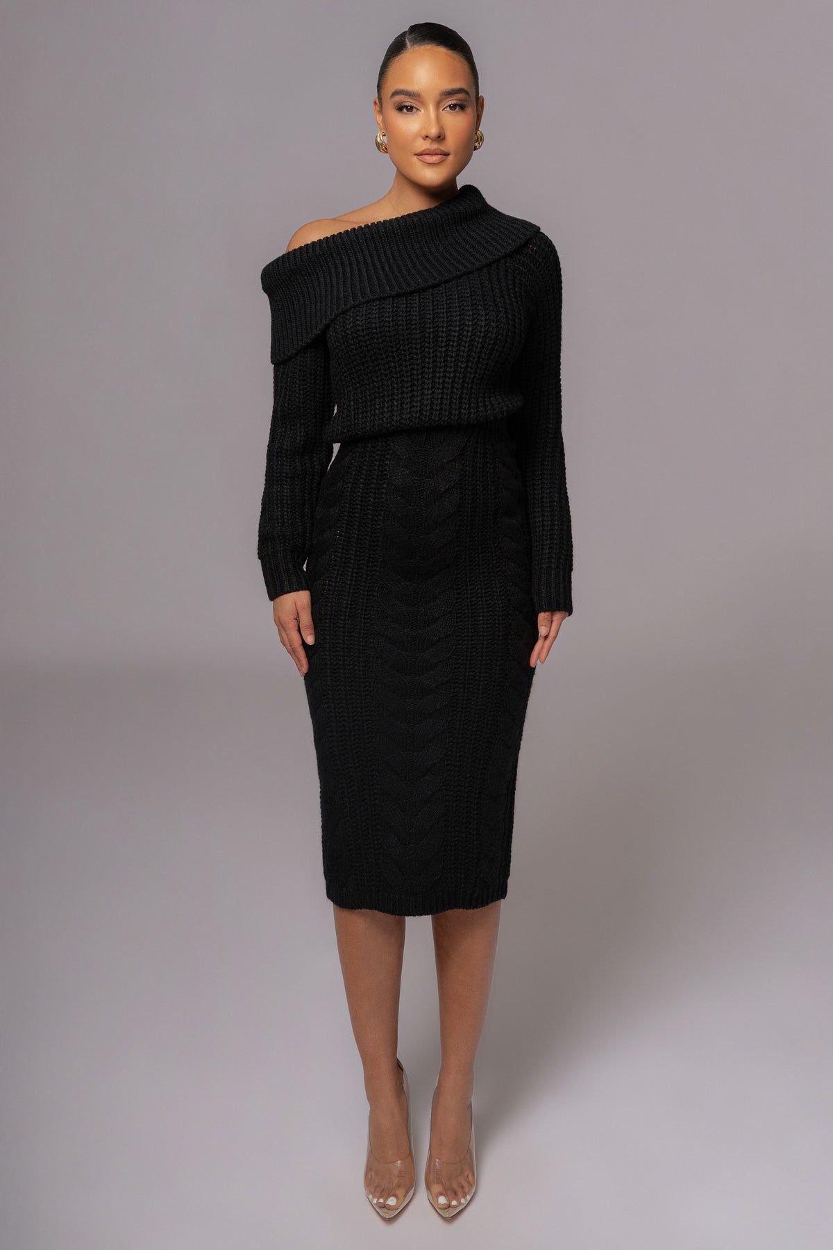 Black Monette Cable Knit Dress by JLUXLABEL featuring a cozy cable knit design and a stylish fit, perfect for casual or chic occasions.
