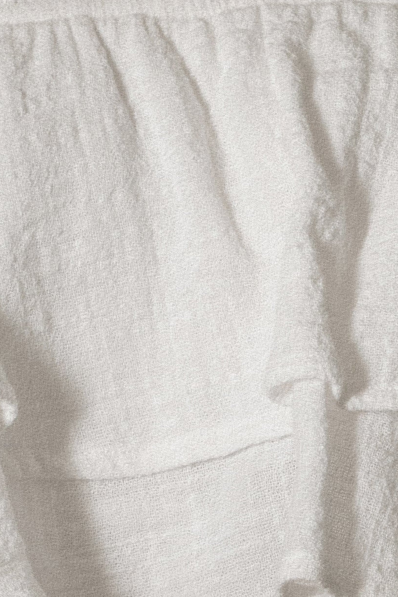 White By The Sea skirt set by JLUXLABEL featuring a stylish, coordinated white top and skirt perfect for casual or summer wear.