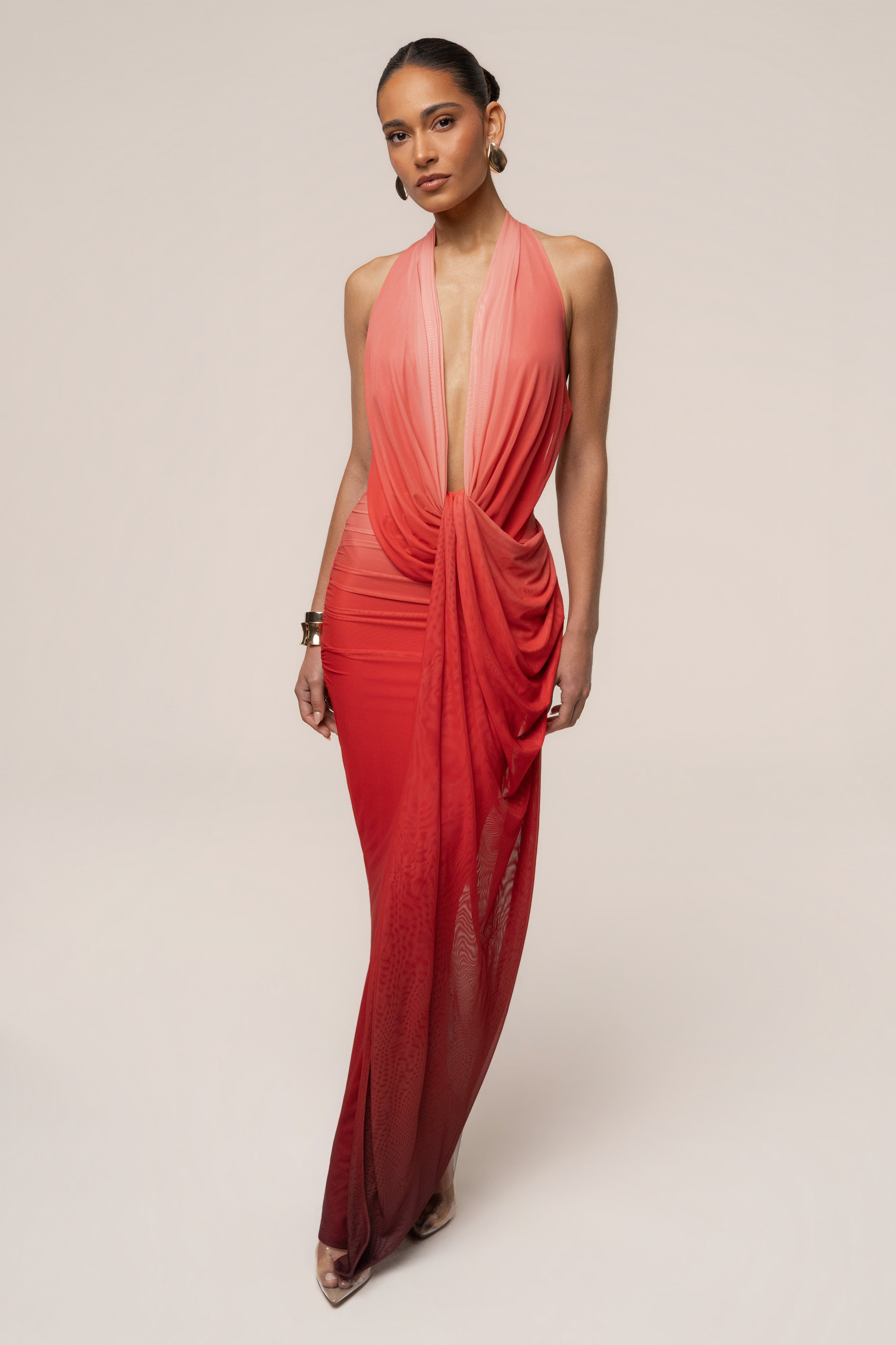 JLUXLABEL Terra Sol Alaina plunge maxi dress in flowing fabric, featuring a deep V neckline and elegant silhouette.
