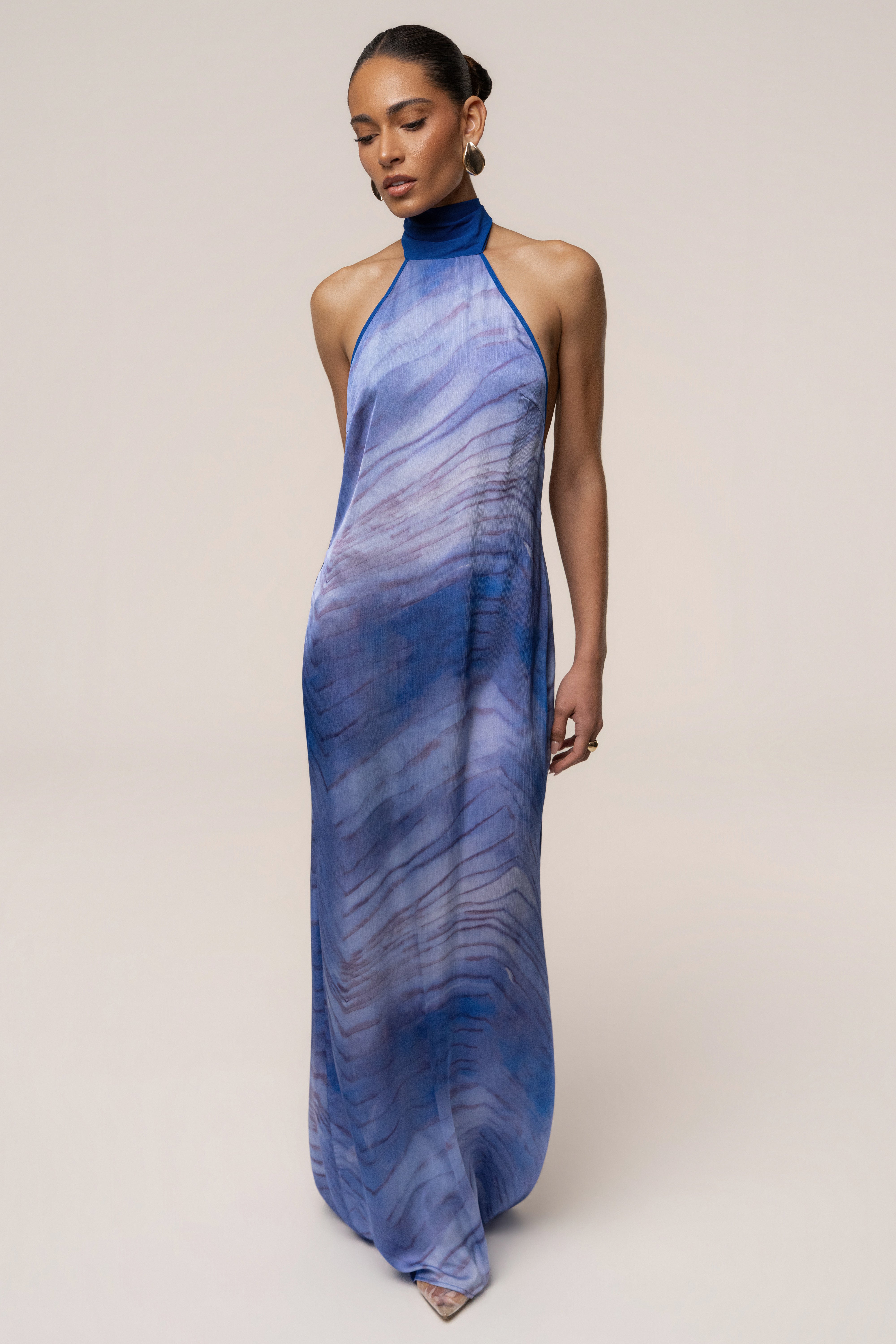 Blue Sunset Waves Maxi Dress by JLUXLABEL featuring a flowing design with vibrant wave patterns and a chic, elegant silhouette.
