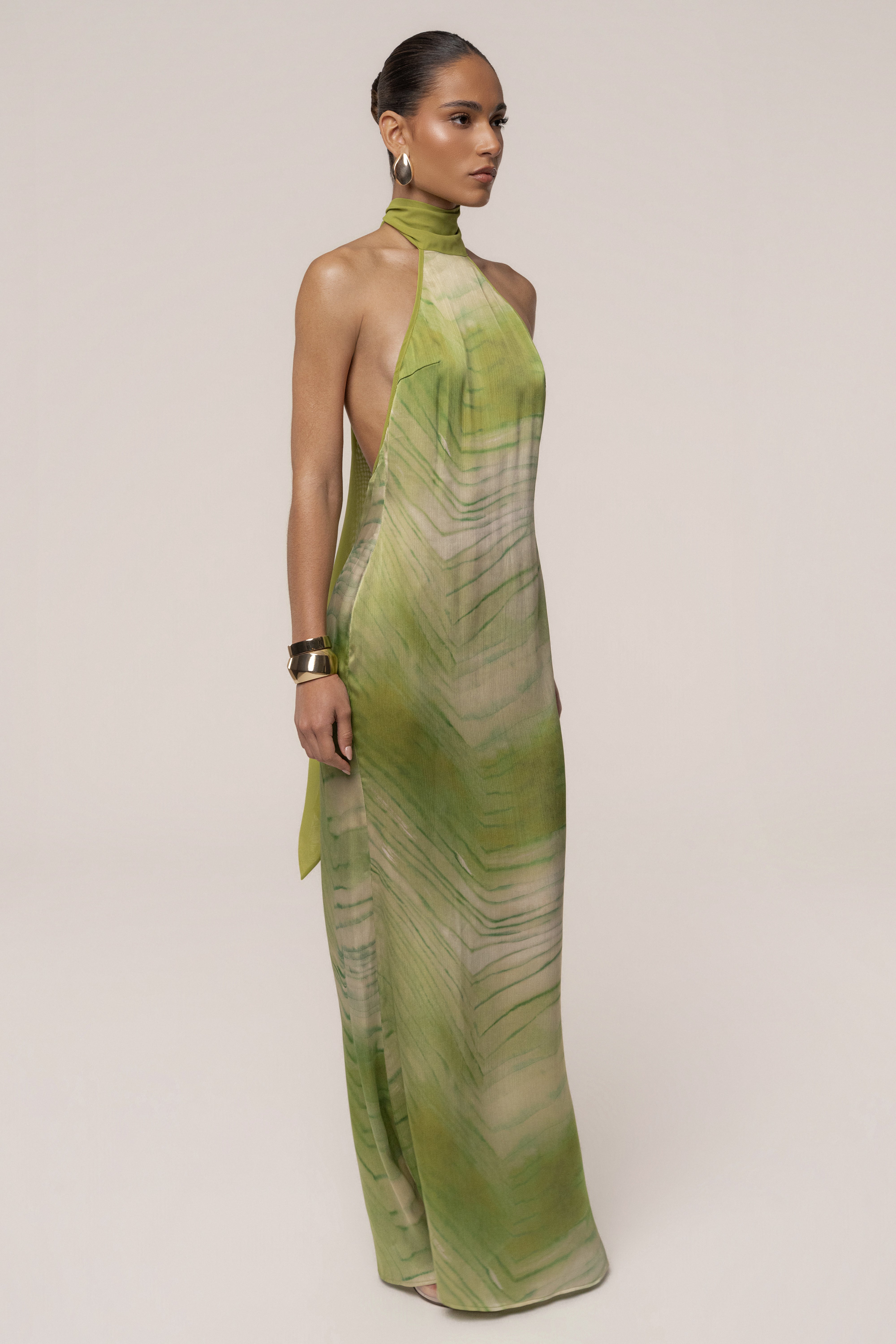 Green Sunset Waves maxi dress by JLUXLABEL featuring a flowing silhouette and vibrant wave pattern.