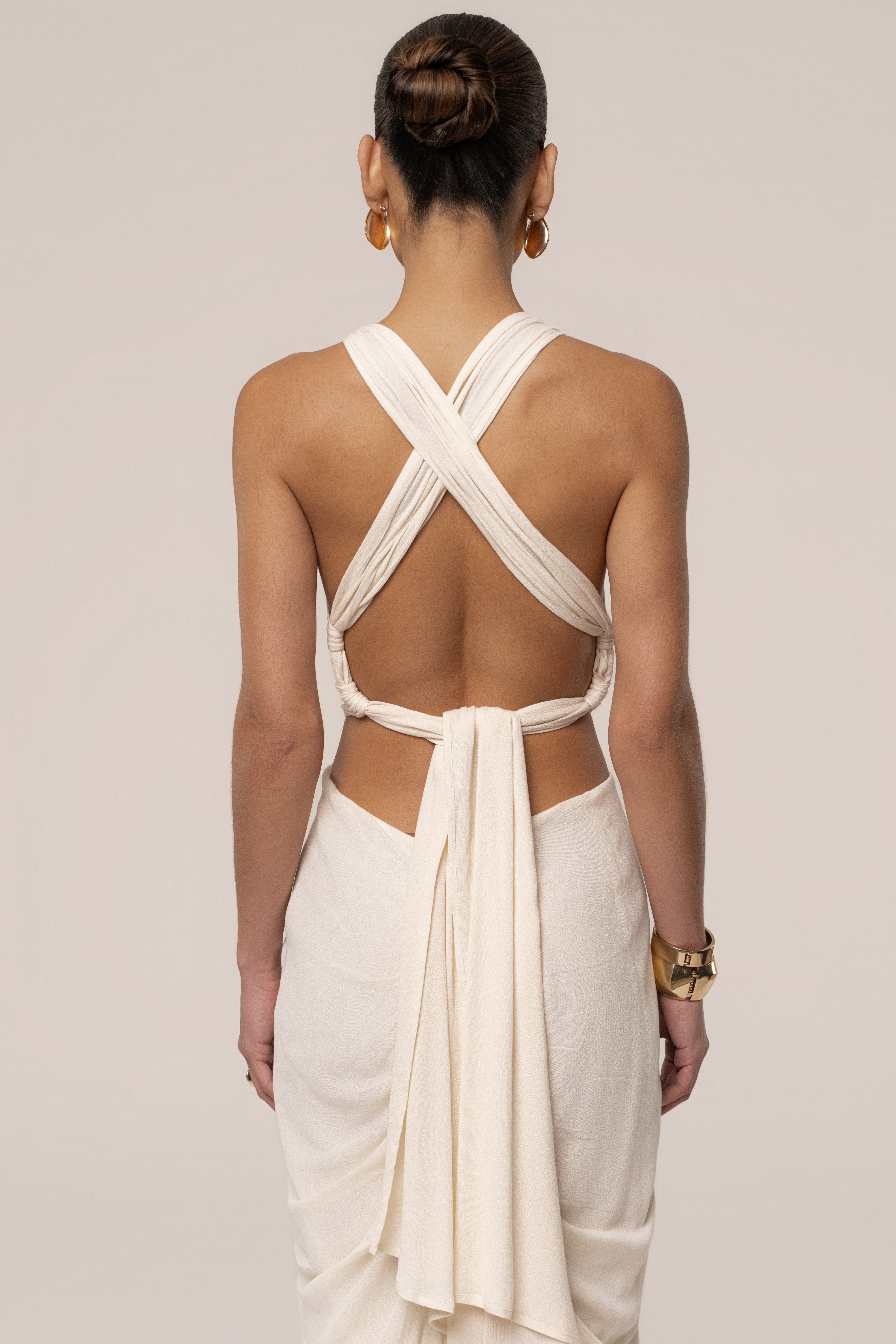 Cream warm sunset maxi dress by JLUXLABEL, flowing fabric with a relaxed fit, featuring a stylish neckline and elegant design.