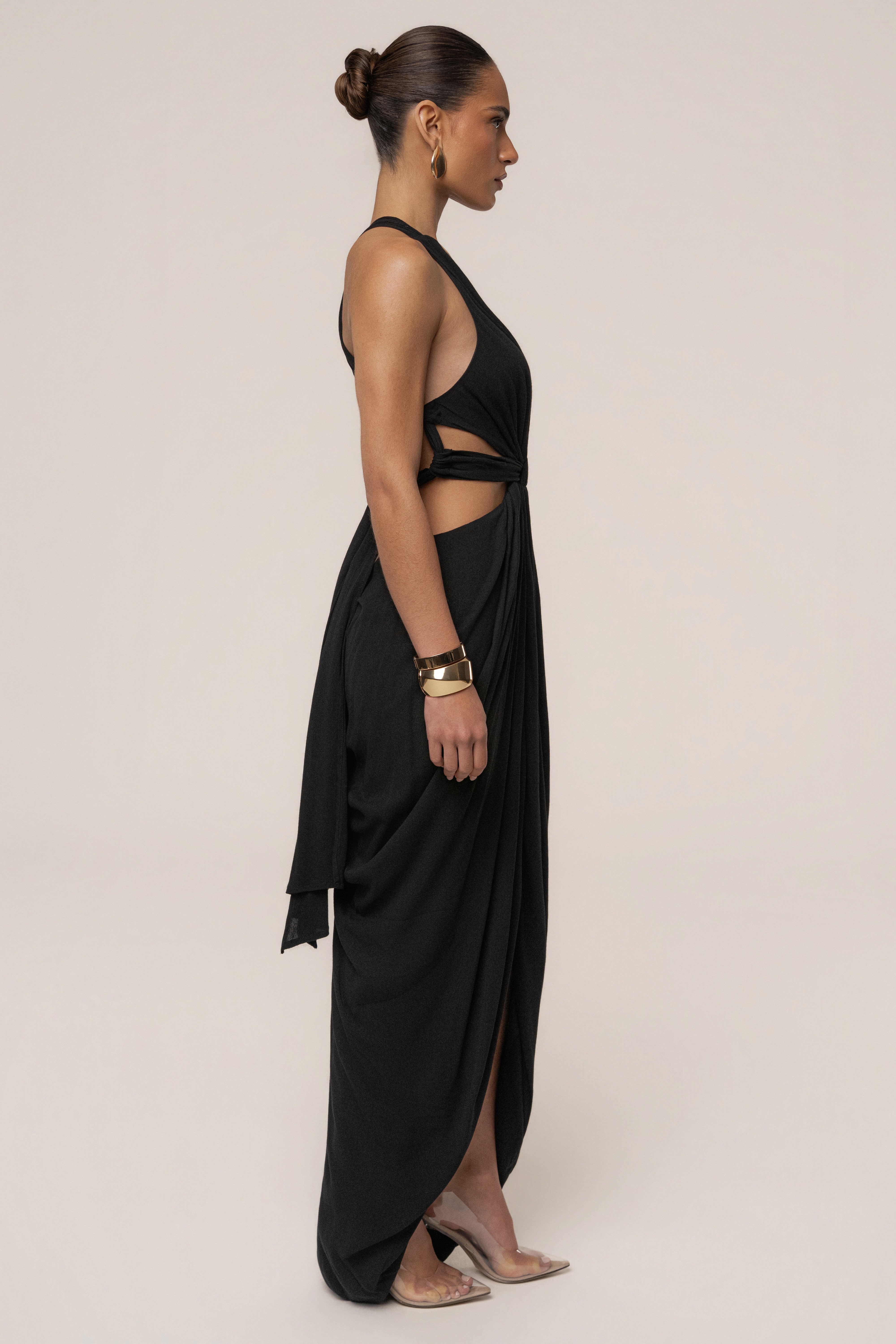 Black Warm Sunsets Maxi Dress by JLUXLABEL featuring a flowing silhouette and sunset-inspired print on soft fabric.