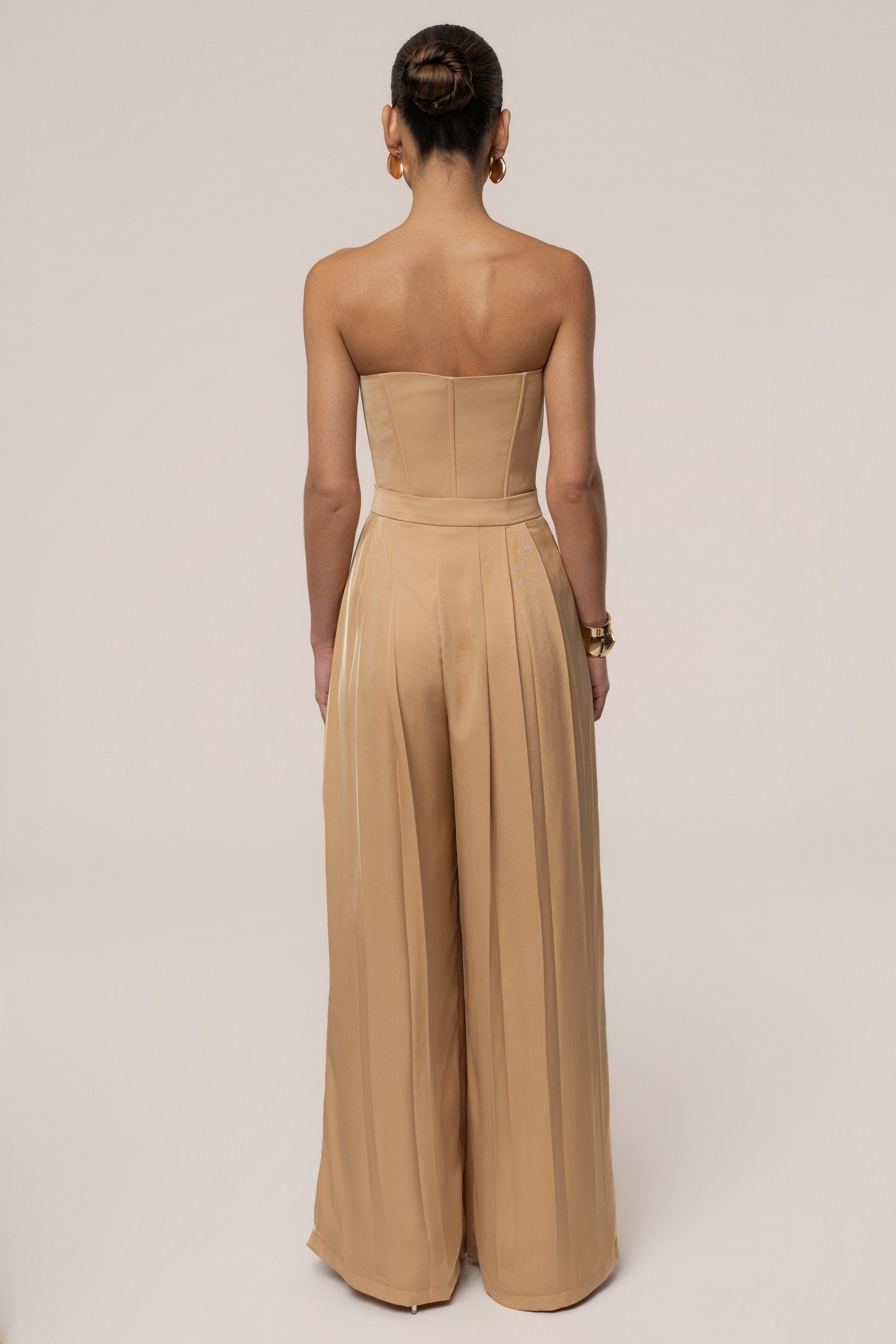 Beige Viv Satin Bustier Top by JLUXLABEL featuring a fitted design and satin fabric, shown on a model.