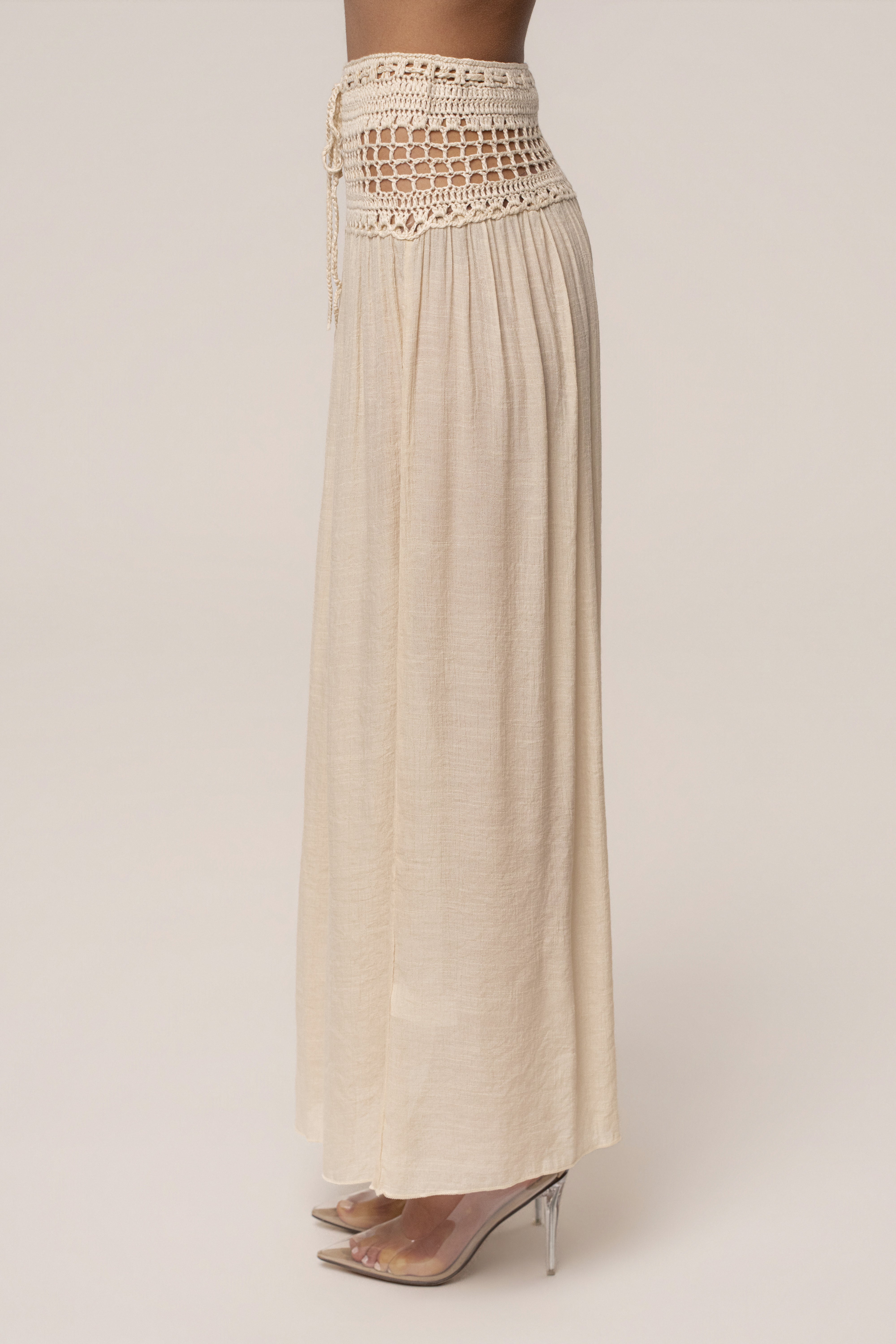 Beige crochet maxi skirt by JLUXLABEL, flowy resort bottoms with intricate crochet details, perfect for summer or beach wear.