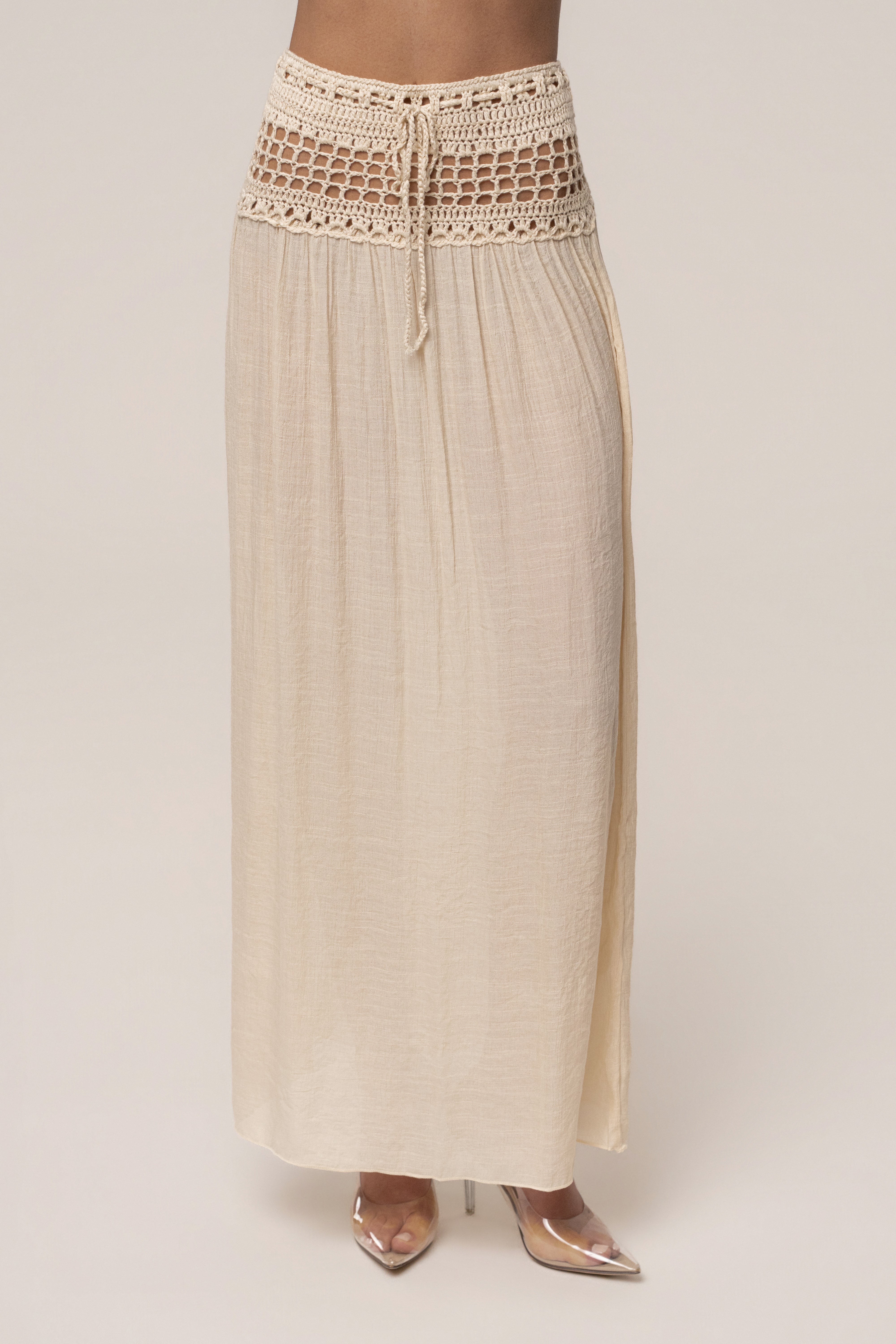 Beige crochet maxi skirt from JLUXLABEL, stylish resort bottoms with intricate crochet details and flowy design.