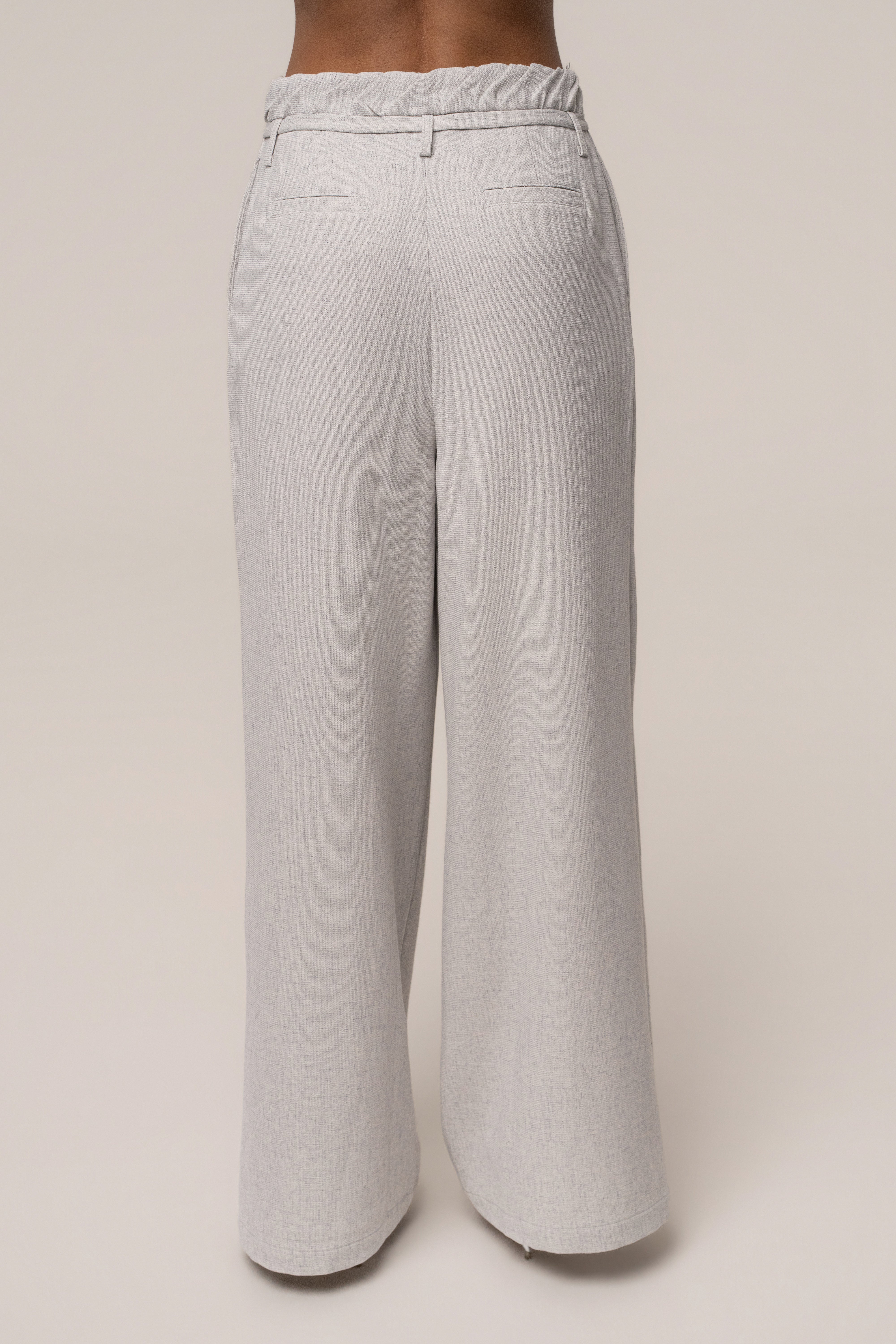 Heather grey JLUXLABEL wide-leg pants, refined and stylish bottoms with a relaxed fit, shown in a natural pose.