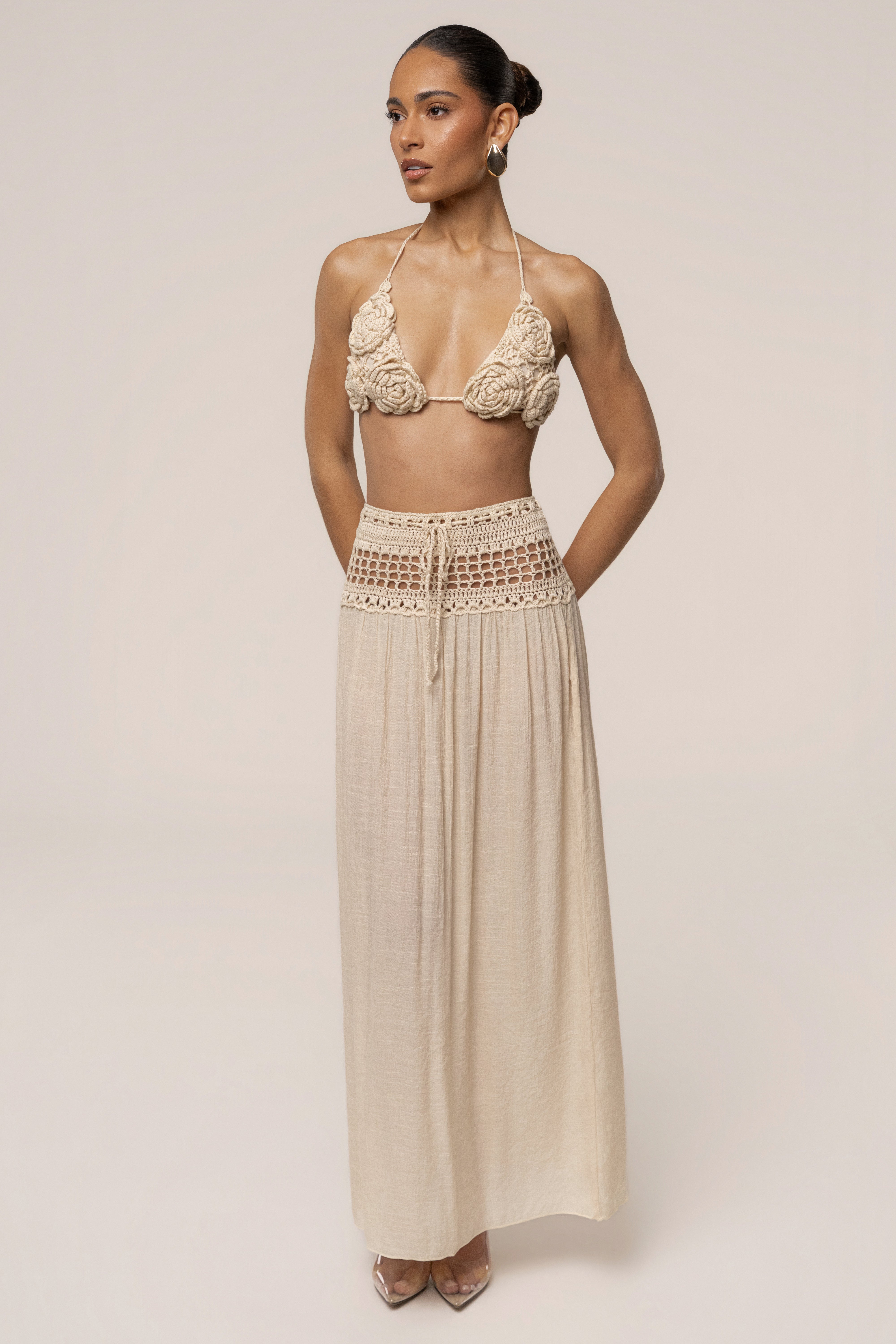 Beige resort crochet maxi skirt by JLUXLABEL, featuring a flowing, boho-inspired design with intricate crochet details.