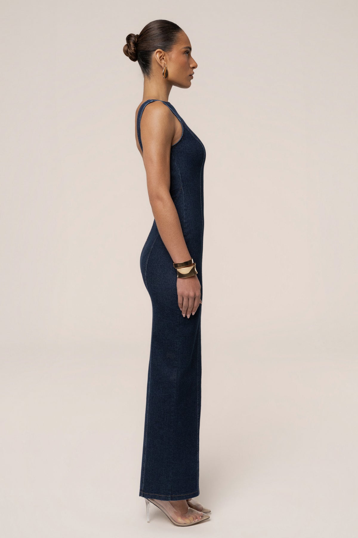 Dark denim sculpt maxi dress from JLUXLABEL featuring a fitted silhouette and flowing length, ideal for stylish occasions.