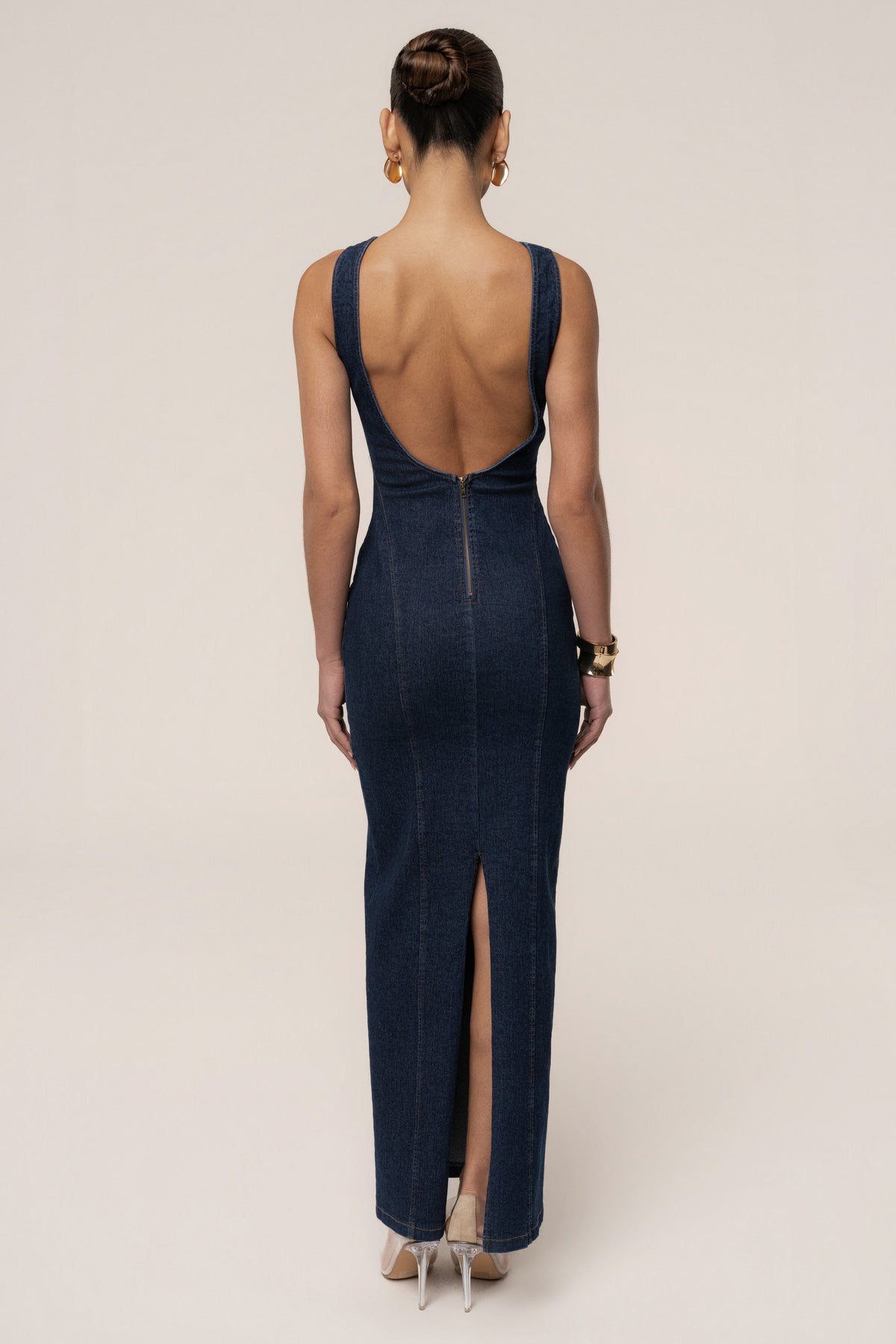 Dark denim JLUXLABEL sculpt maxi dress displayed on a hanger with a flowing fit and sleeveless design.