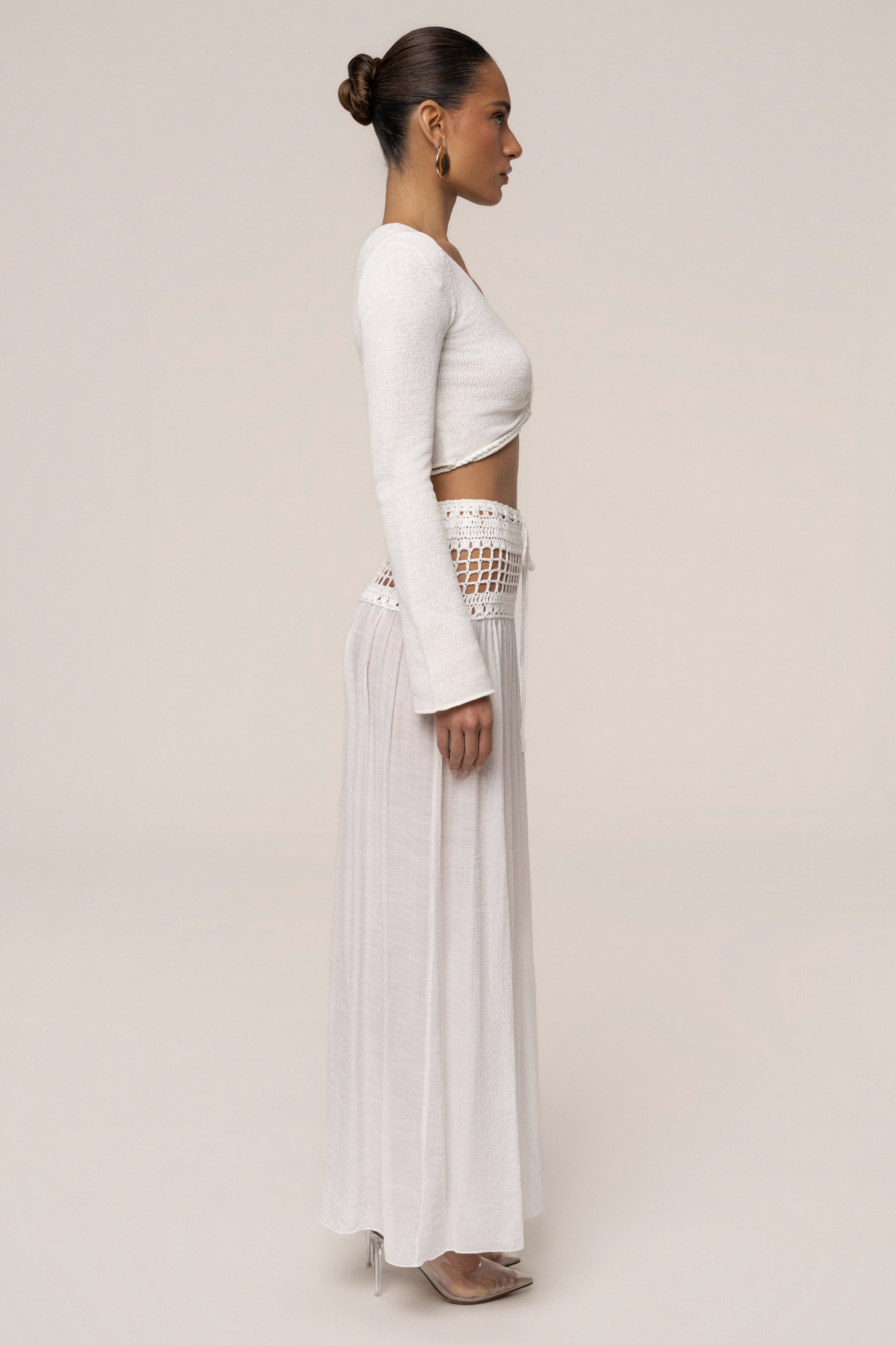 Ivory resort crochet maxi skirt by JLUXLABEL, featuring a flowing design and intricate crochet details.