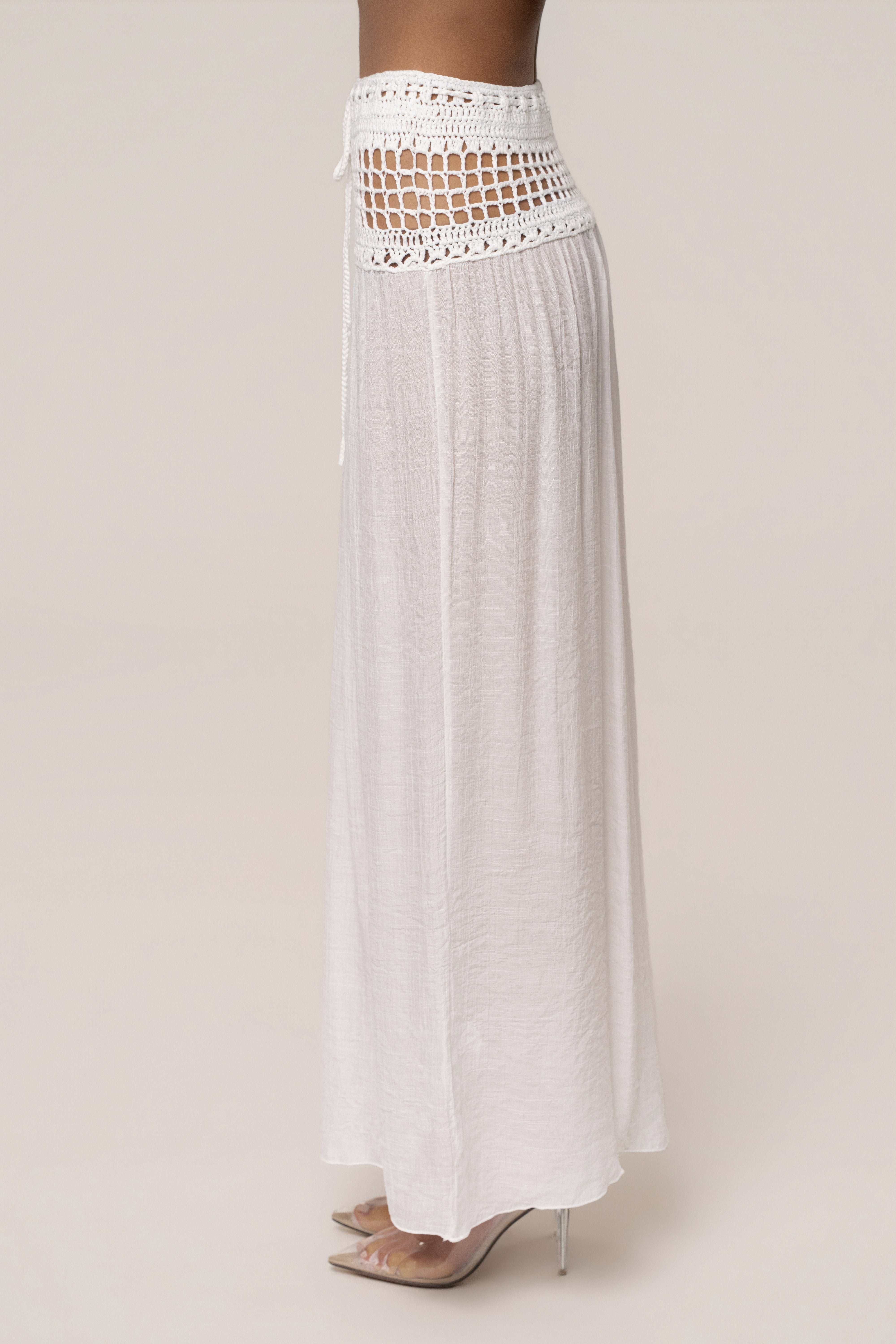 Ivory crochet maxi skirt from JLUXLABEL featuring a flowy resort-style design, perfect for casual and beachwear looks.